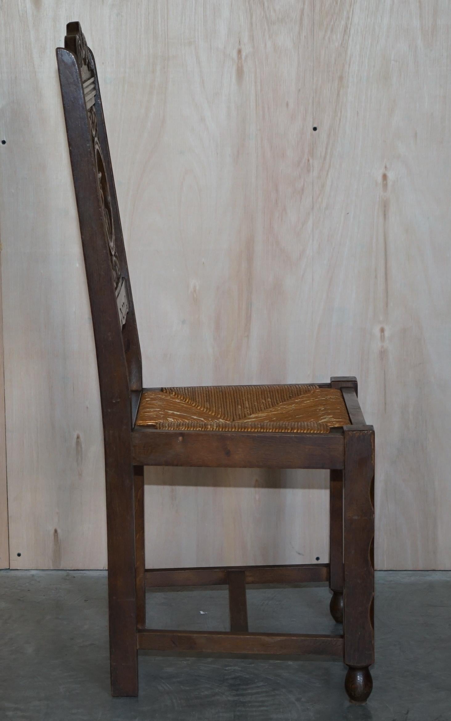 Stunning Pair of Antique circa 1920 Rush Seat Hand Carved Oak Brittany Chairs For Sale 3