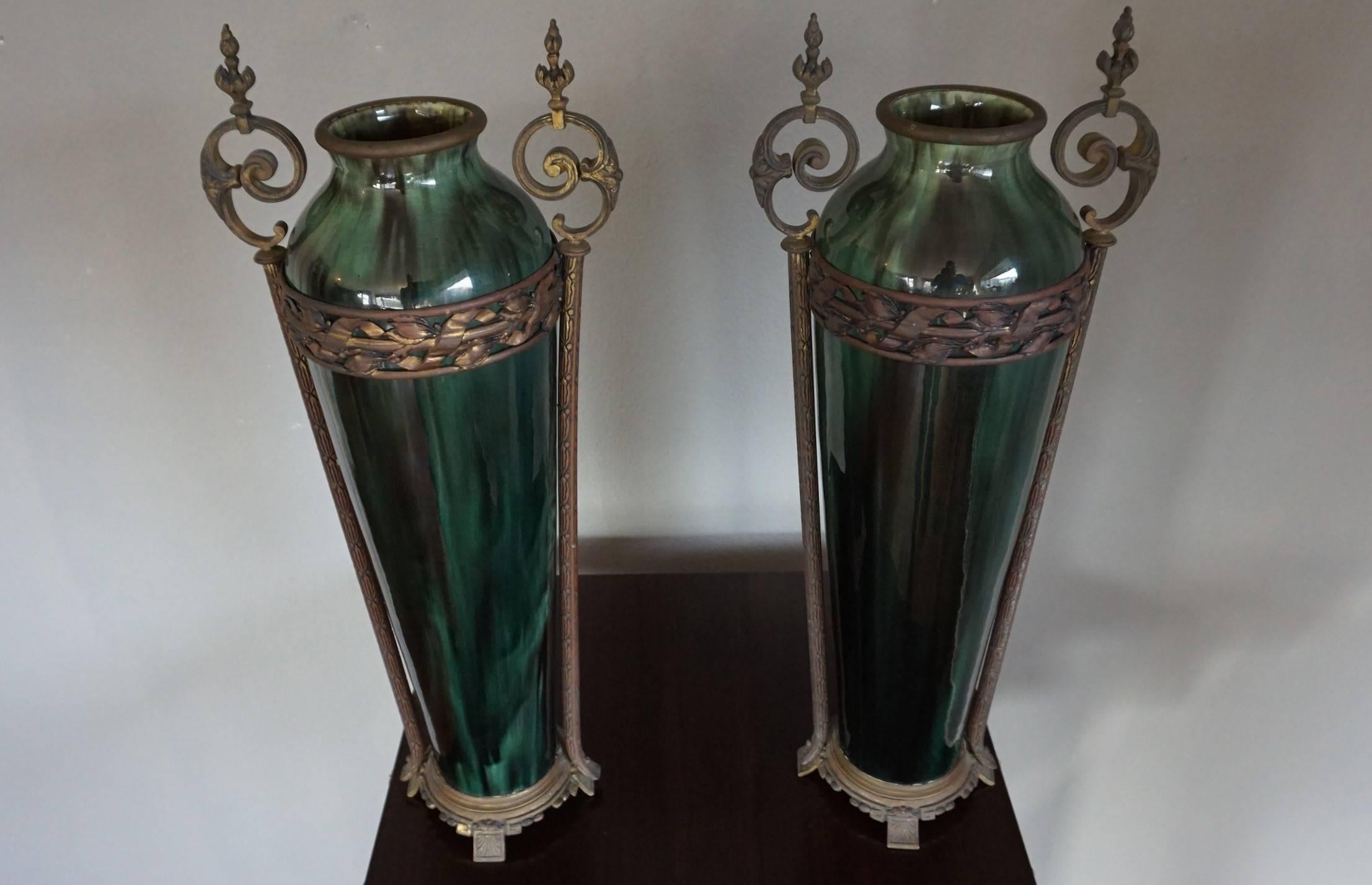 Large pair of 19th century, top quality vases.

If you are looking for 19th century, European grandeur then these antique French vases may be perfect for your home. The design and the craftsmanship that went into creating these sizable vases makes