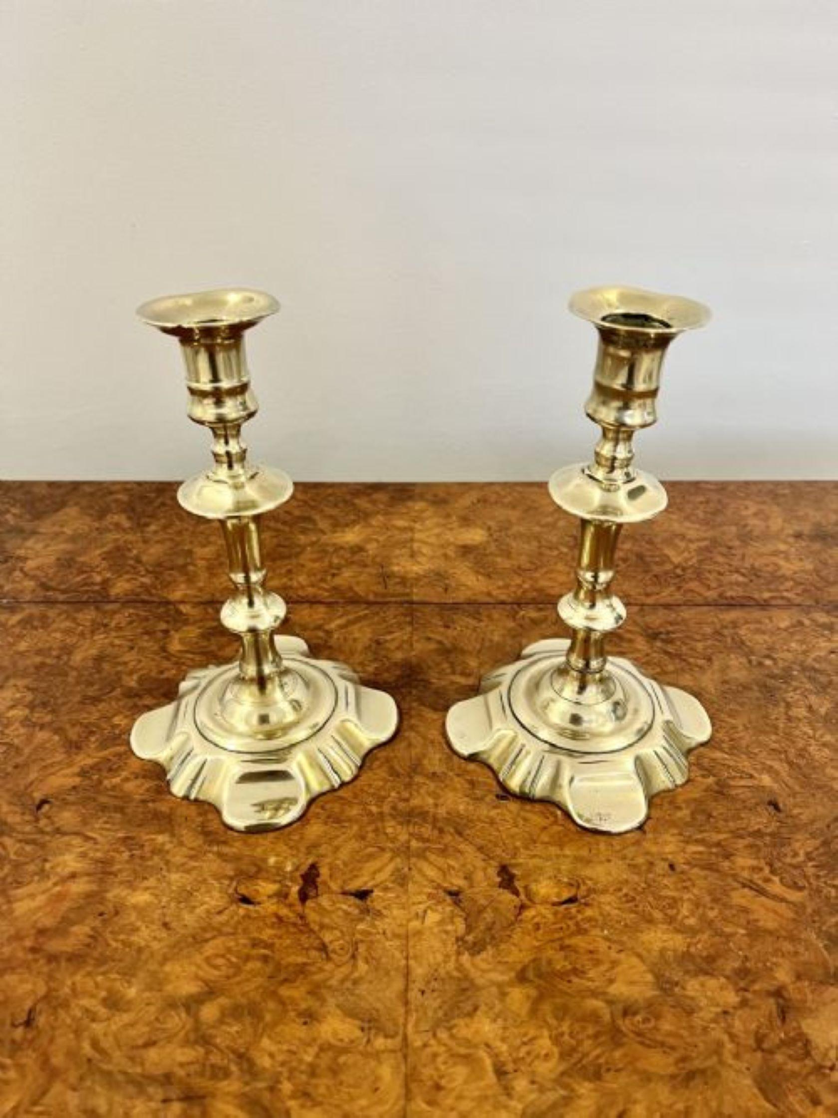 Stunning pair of antique Queen Ann quality brass candlesticks having a quality original pair of antique Queen Ann petal base brass candlesticks 