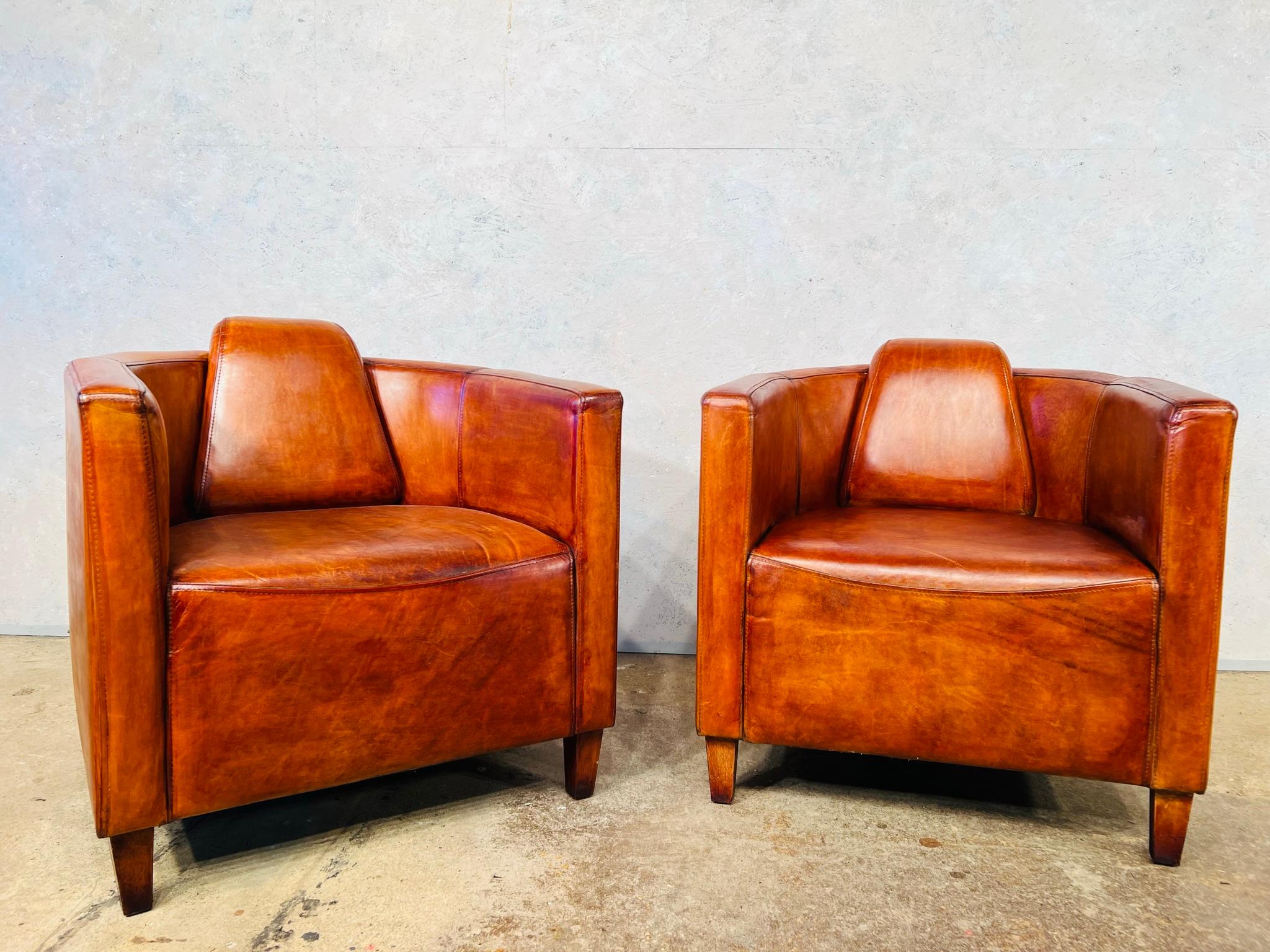 A stylish Pair of Art deco style Leather chairs, they have a fantastic hand dyed tan colour and a beautiful Finish to the leather.

In great condition.

 