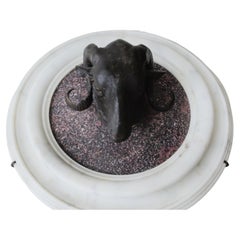 Stunning Pair of Bronze Rams Heads on Porphyry