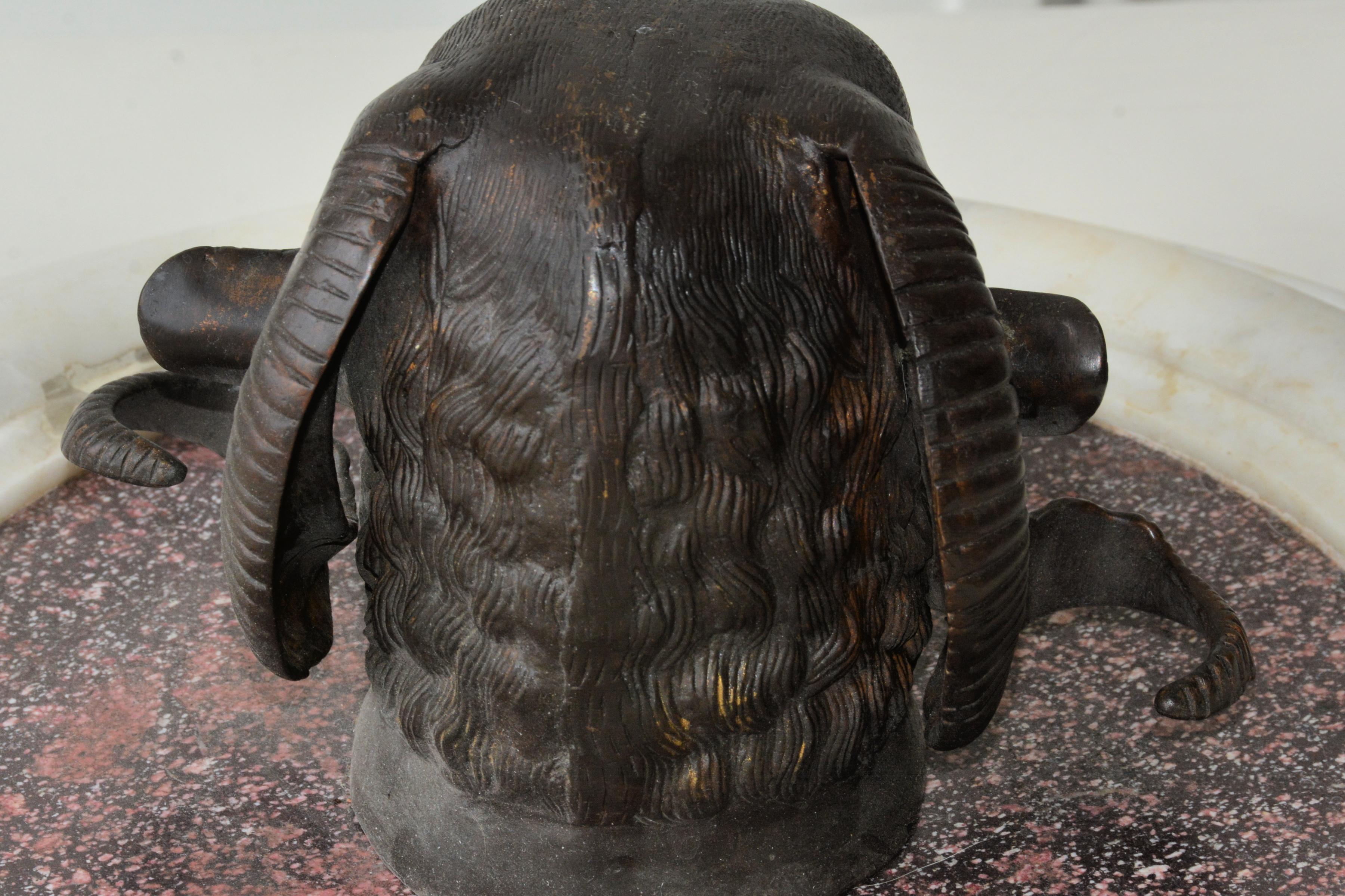 19th Century Stunning Pair of Bronze Rams Heads on Porphyry For Sale