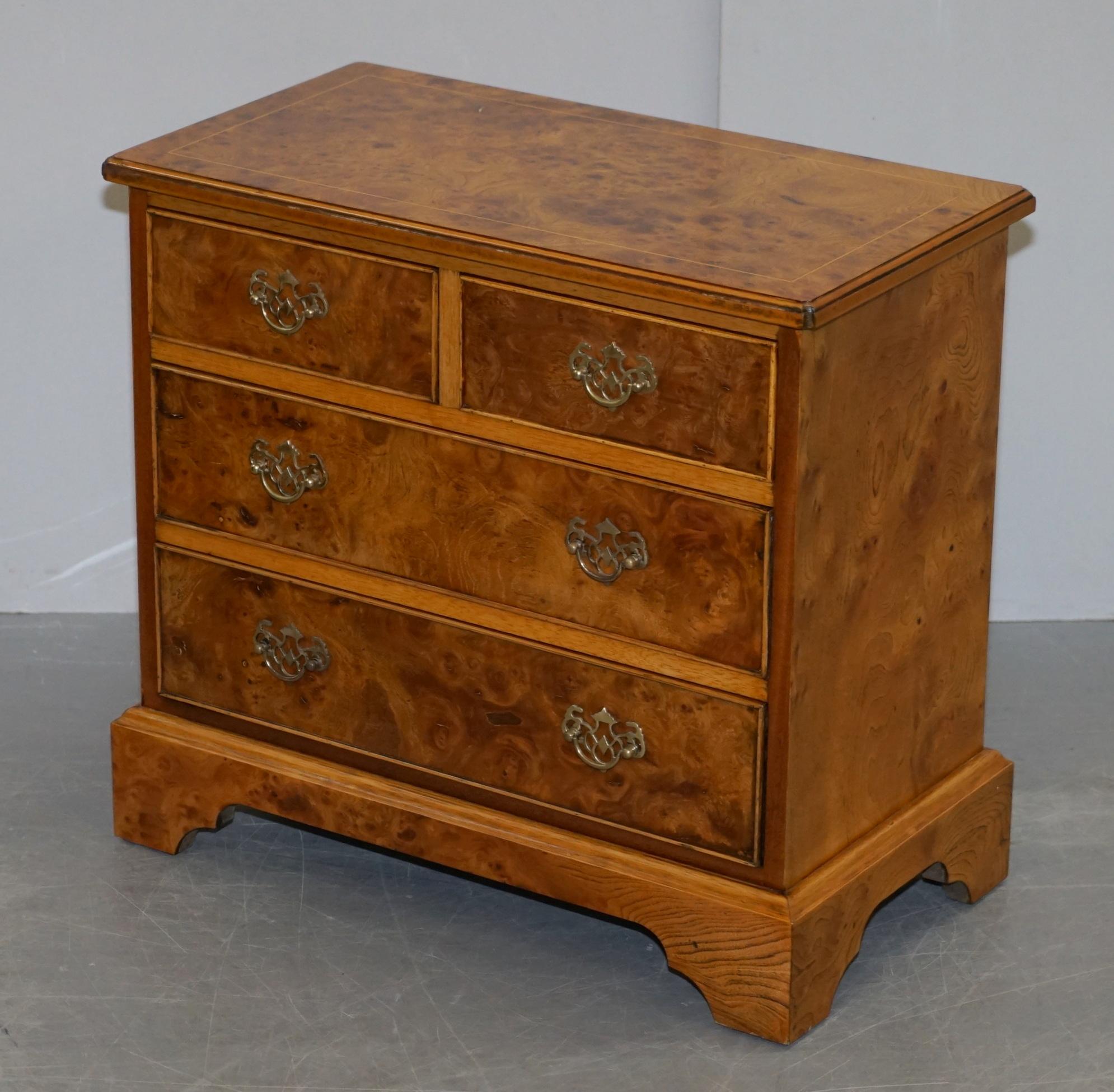 We are delighted to offer for sale this exquisite pair of made in England burr & burl walnut & elm bedside table sized chests of drawers.

Ideally suited as lamp or wine tables in a sitting room context or as bedside tables. The timber patina is