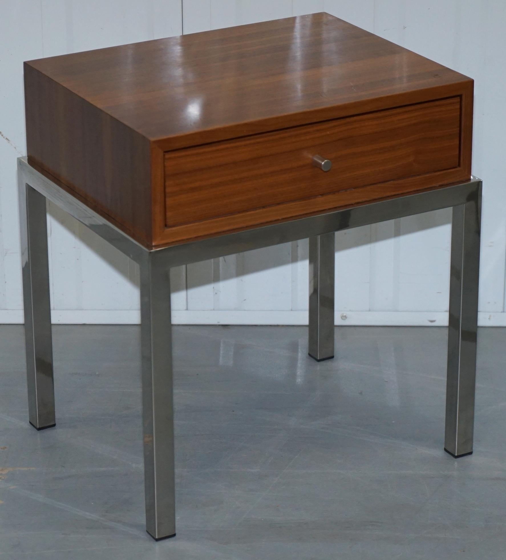We atre delighted to offer for sale this lovely pair of chromed base teak top contemporary lamp or wine single drawer tables

I have listed under my other items a similar styled coffee table

These are a good looking and well made, decorative