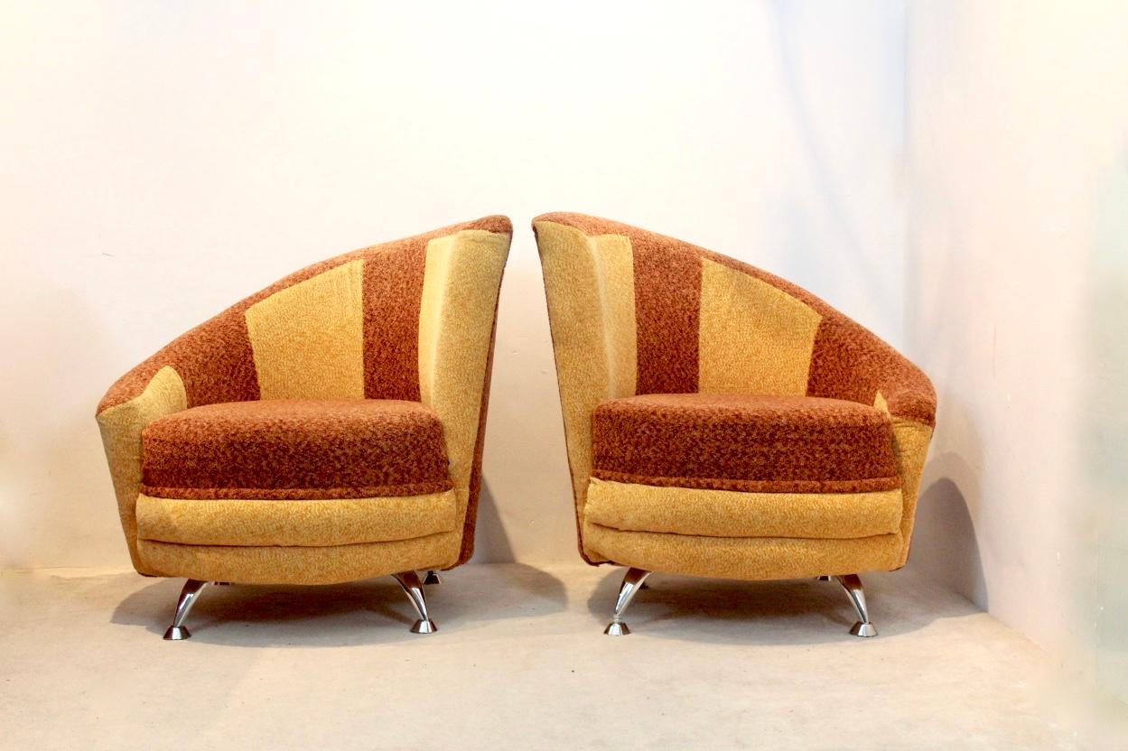 Very special pair of cocktail chairs designed by František Jirák for Tatra Nabytok in the former Czechoslovakia in the 1970s. The chairs feature chromed legs and two colored upholstery. In good condition with normal signs of use and aging. Very