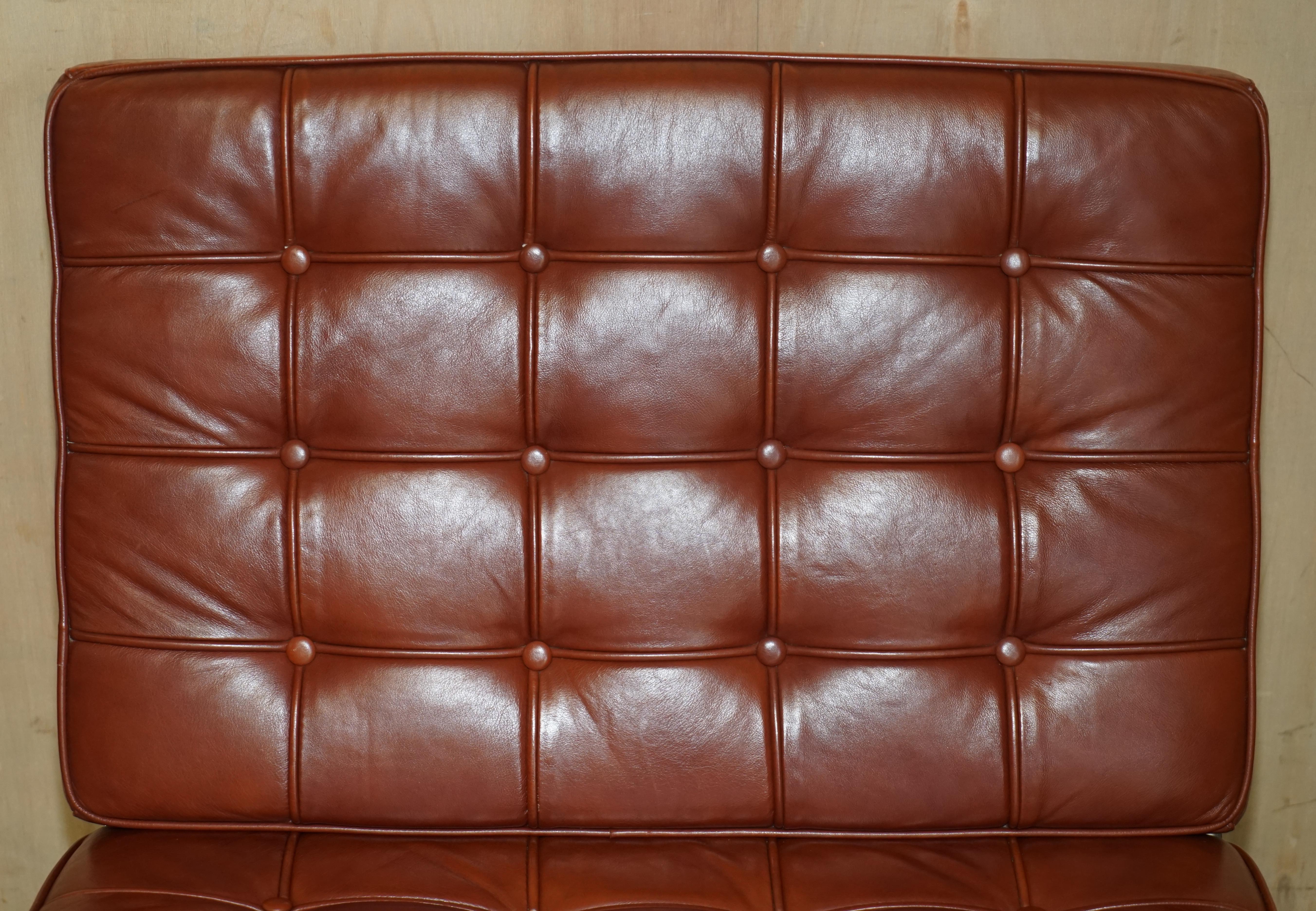 English Stunning Pair of Contemporary Designed Brown Leather Lounge Armchairs & Ottomans For Sale