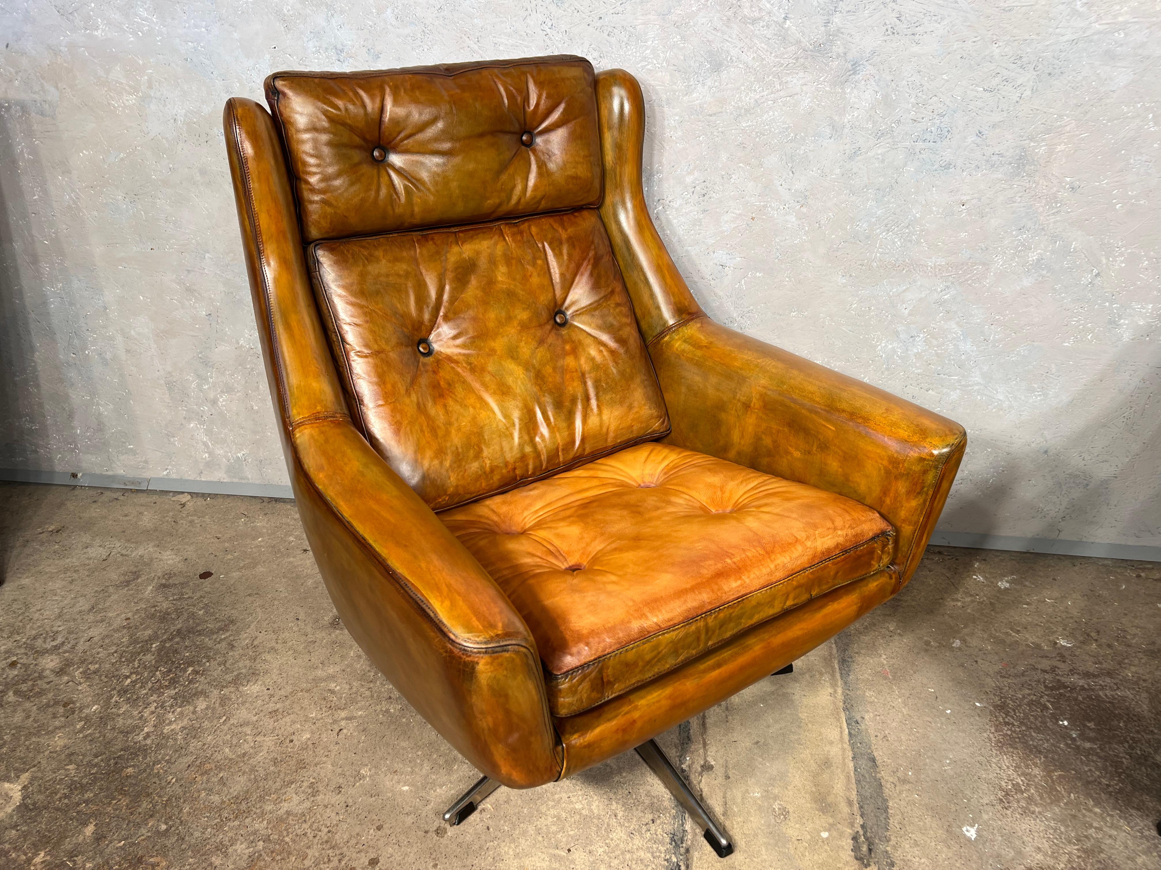 A stunning pair of Danish Swivel Chairs , great design, very comfortable to sit in, a most beautiful tan colour with a great finish.

In great condition.

Viewings welcome at our showroom in Lewes, East Sussex.