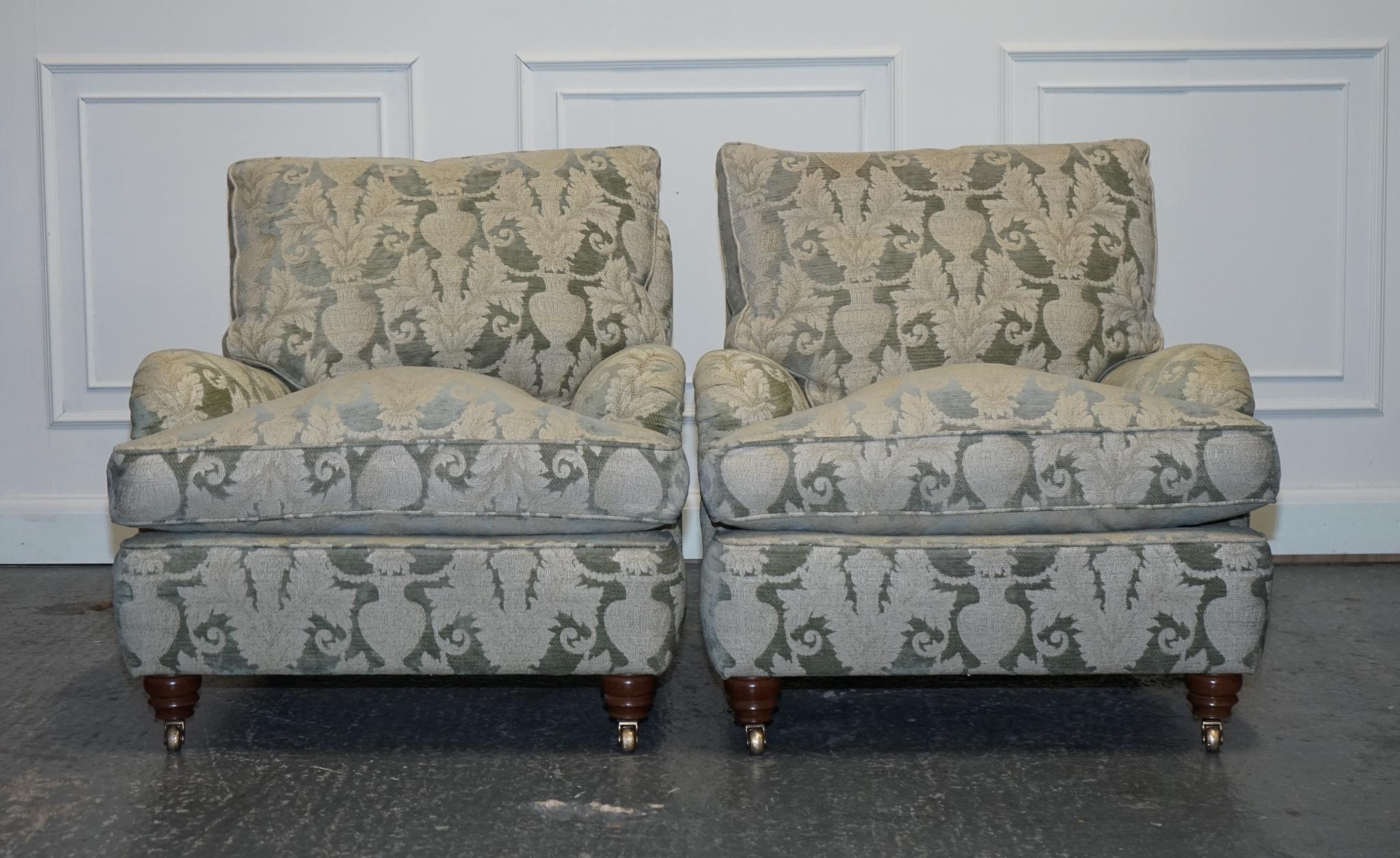 
We are delighted to offer for sale this Lovely Pair Of Duresta Lansdowne Howard Style Armchairs.

 A pair of Duresta Howard style fabric armchairs are a luxurious and elegant seating option that exudes comfort and sophistication. These armchairs