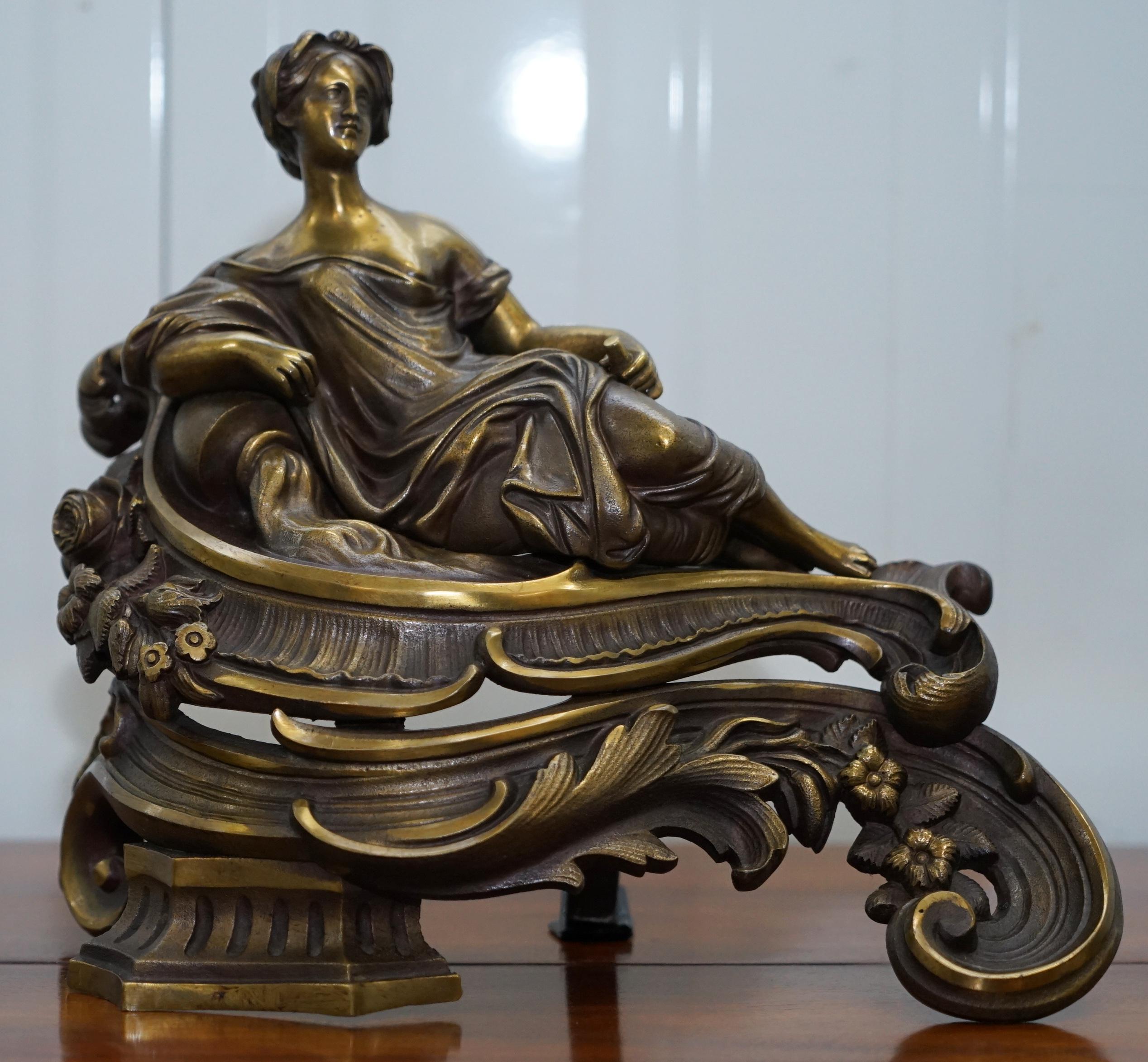 We are delighted to offer for sale this pair of original early Louis XVI handmade solid bronze Chenets after Bouhon Fres Paris

A rare, beautiful and decorative pair, they are nicely gilt and the casting is sublime, the expressions on the faces of