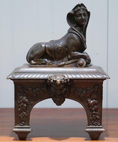 Stunning Pair of Early Louis XVI French Bronze Chenets with Recumbent Sphinx