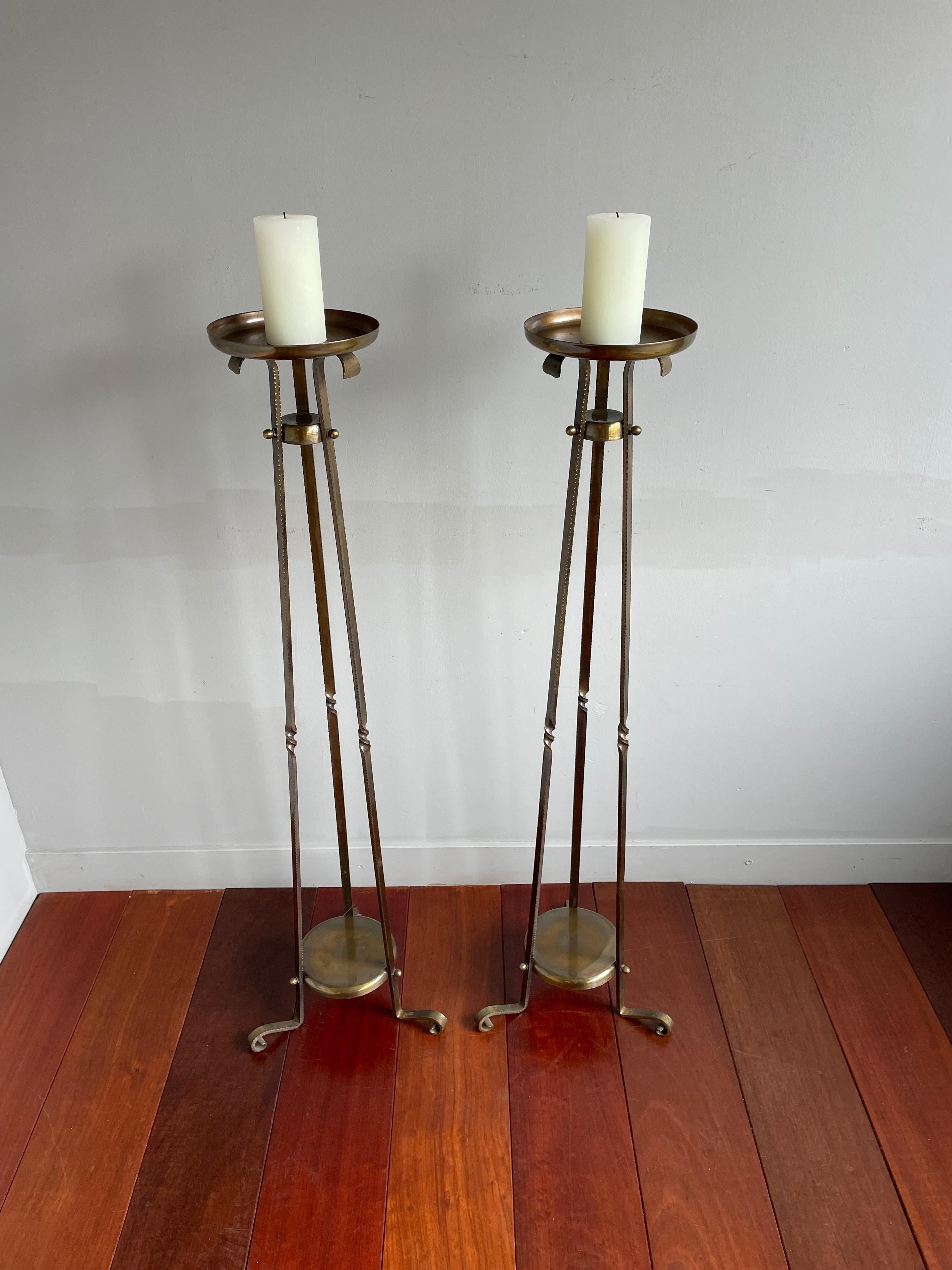 Rare and amazing condition, solid brass Arts & Crafts church altar candle stands.

This finest quality pair of church altar candle stands was all handcrafted in circa 1910-1920 and the bronze patinated solid brass has the most beautiful patina.
