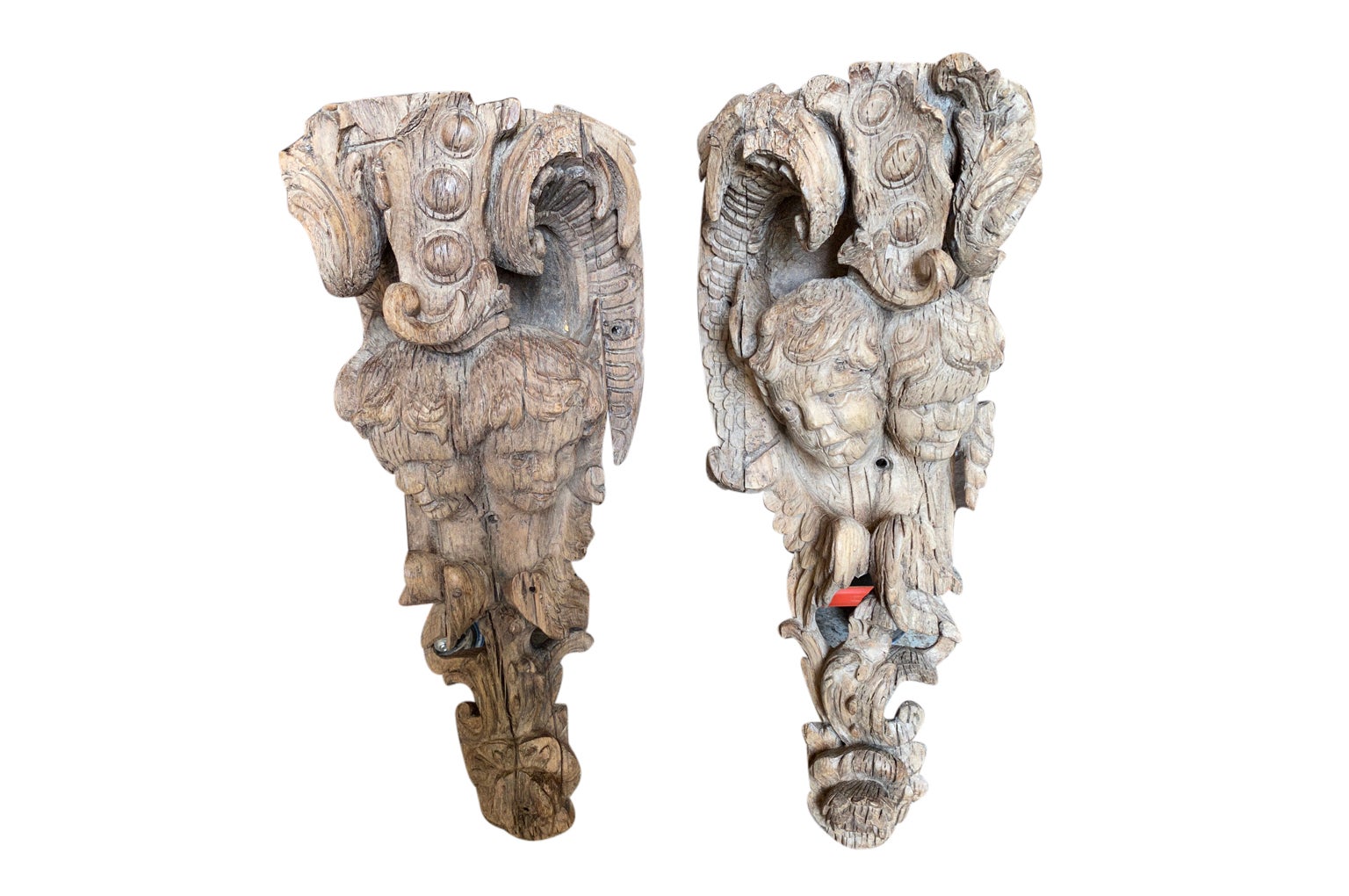 A truly stunning pair of 17th century Wall Brackets from the Provence region of France. Expertly carved with Putti heads having wonderful expressions. Excellent patina.