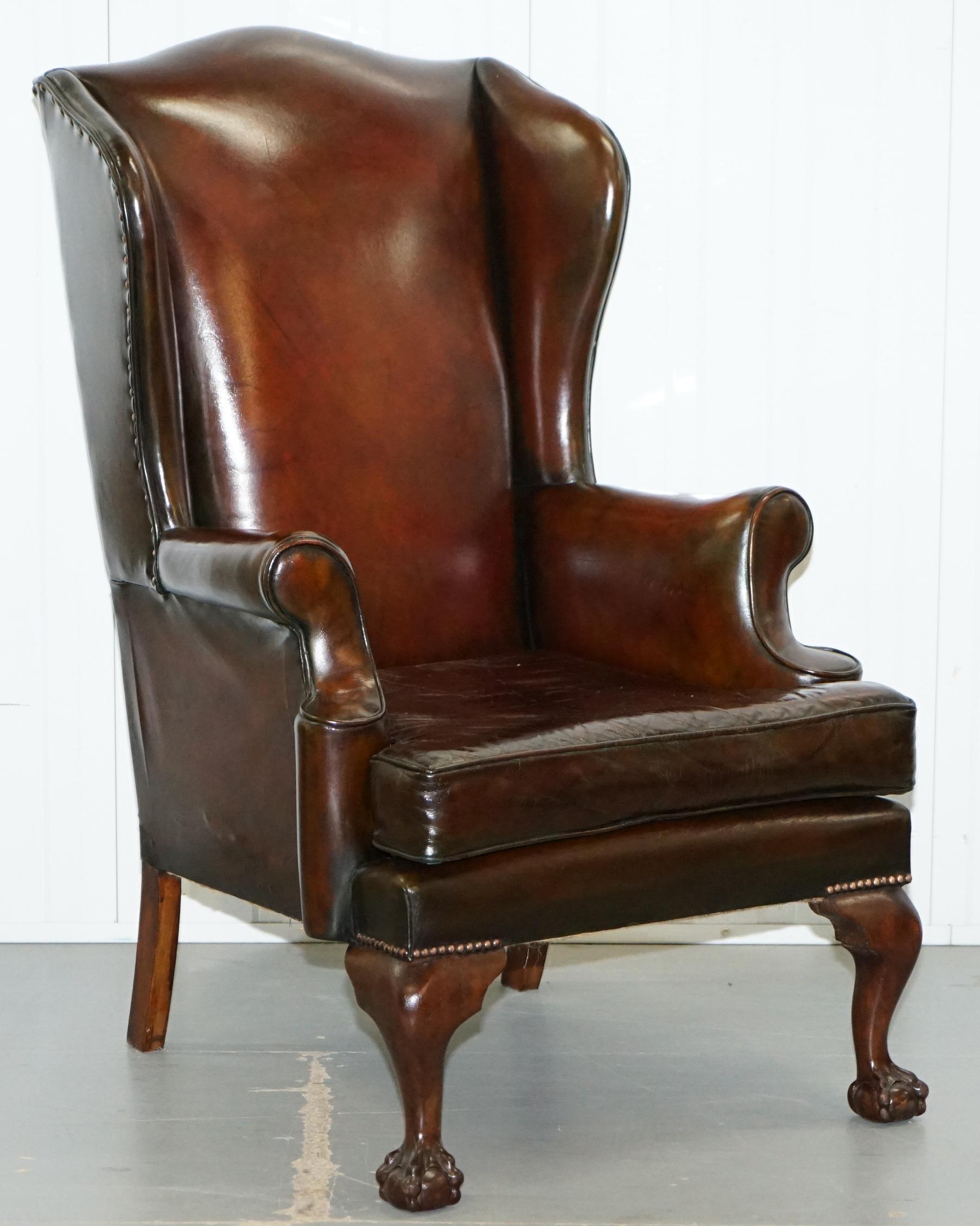 We are delighted to offer for sale this stunning pair of restored circa 1930 wingback armchairs with oversized hand carved claw and ball feet.

A good looking and well-made pair, nice to see with the hand carved claw and ball feet, they have a