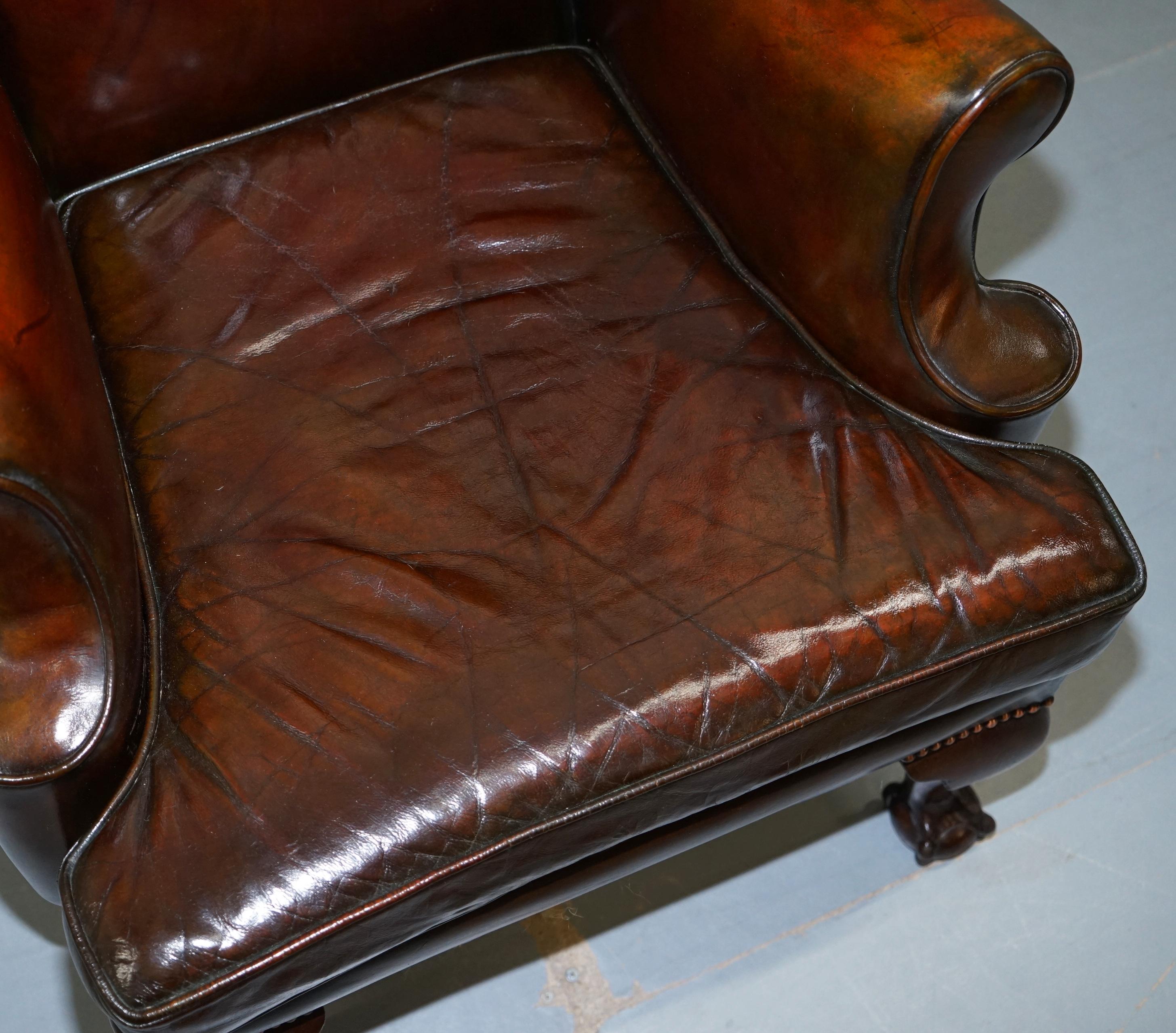 British Stunning Pair of Fully Restored Claw and Wingback Cigar Brown Leather Armchairs