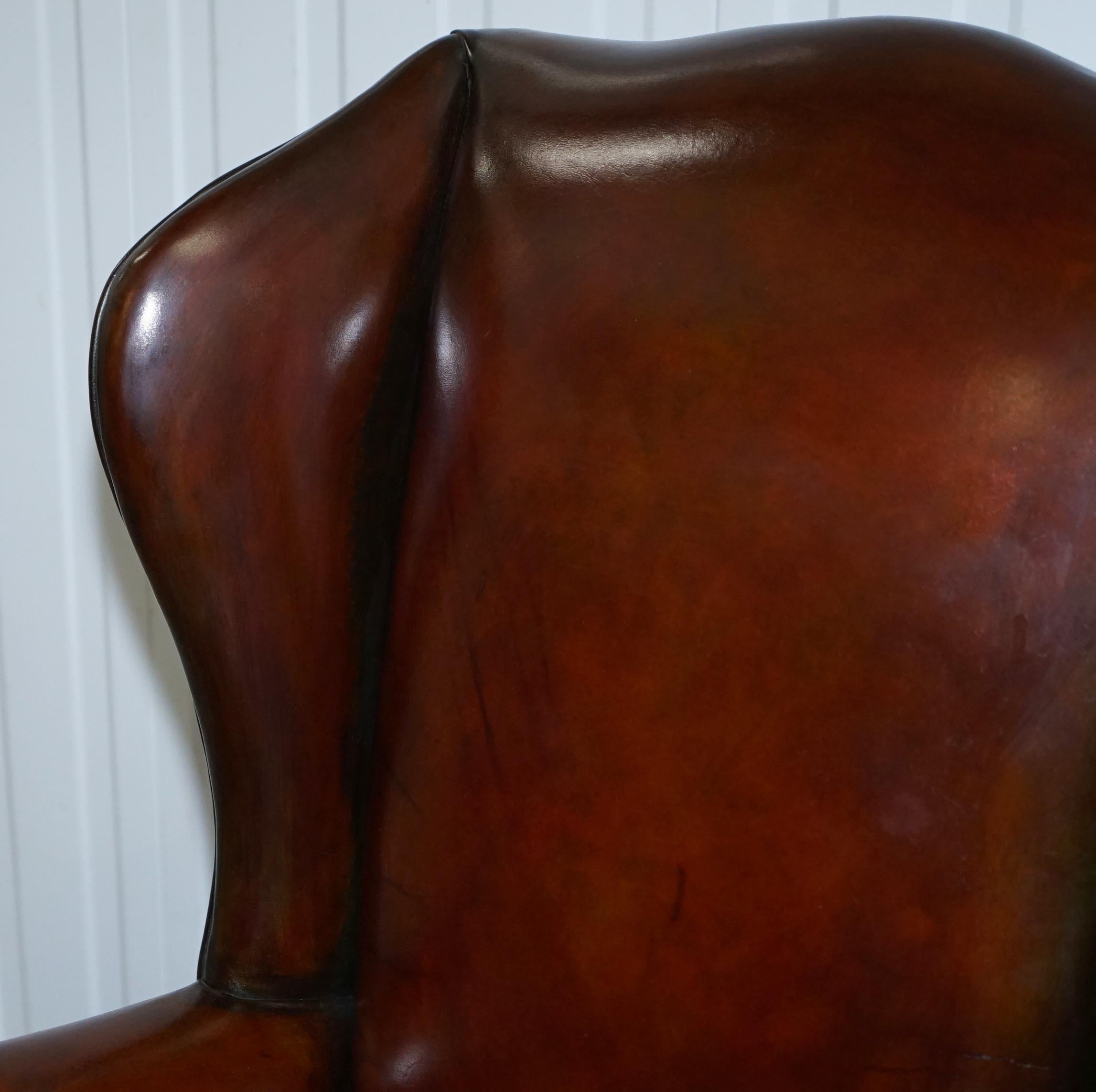 Carved Stunning Pair of Fully Restored Claw and Wingback Cigar Brown Leather Armchairs