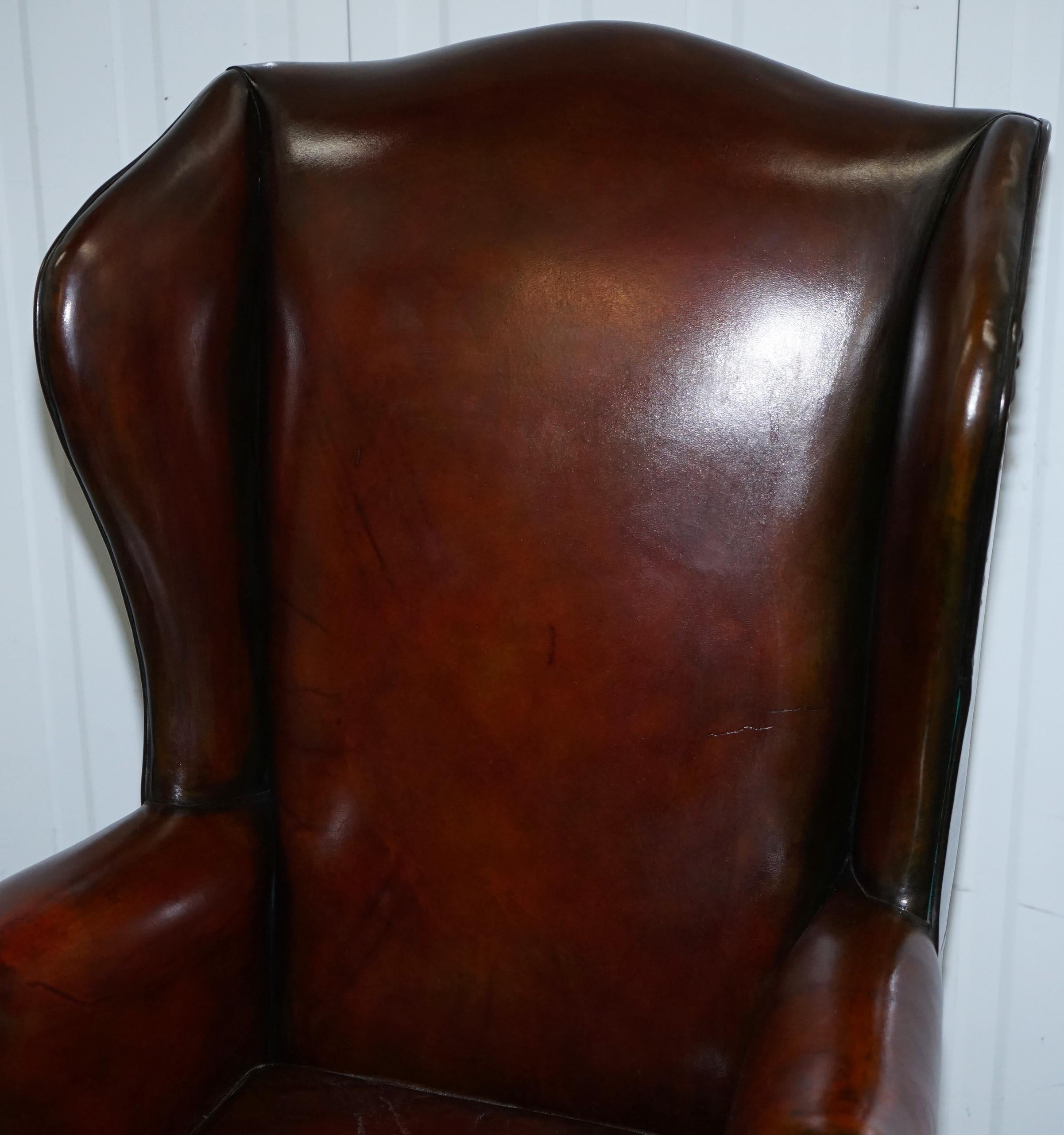 Mid-20th Century Stunning Pair of Fully Restored Claw and Wingback Cigar Brown Leather Armchairs