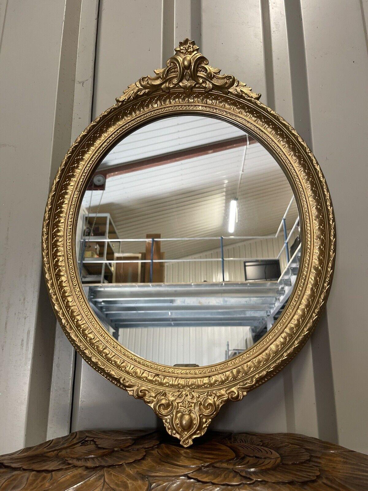 STUNNiNG PAIR OF GOLD GILTED OVAL MIRRORS at 1stDibs