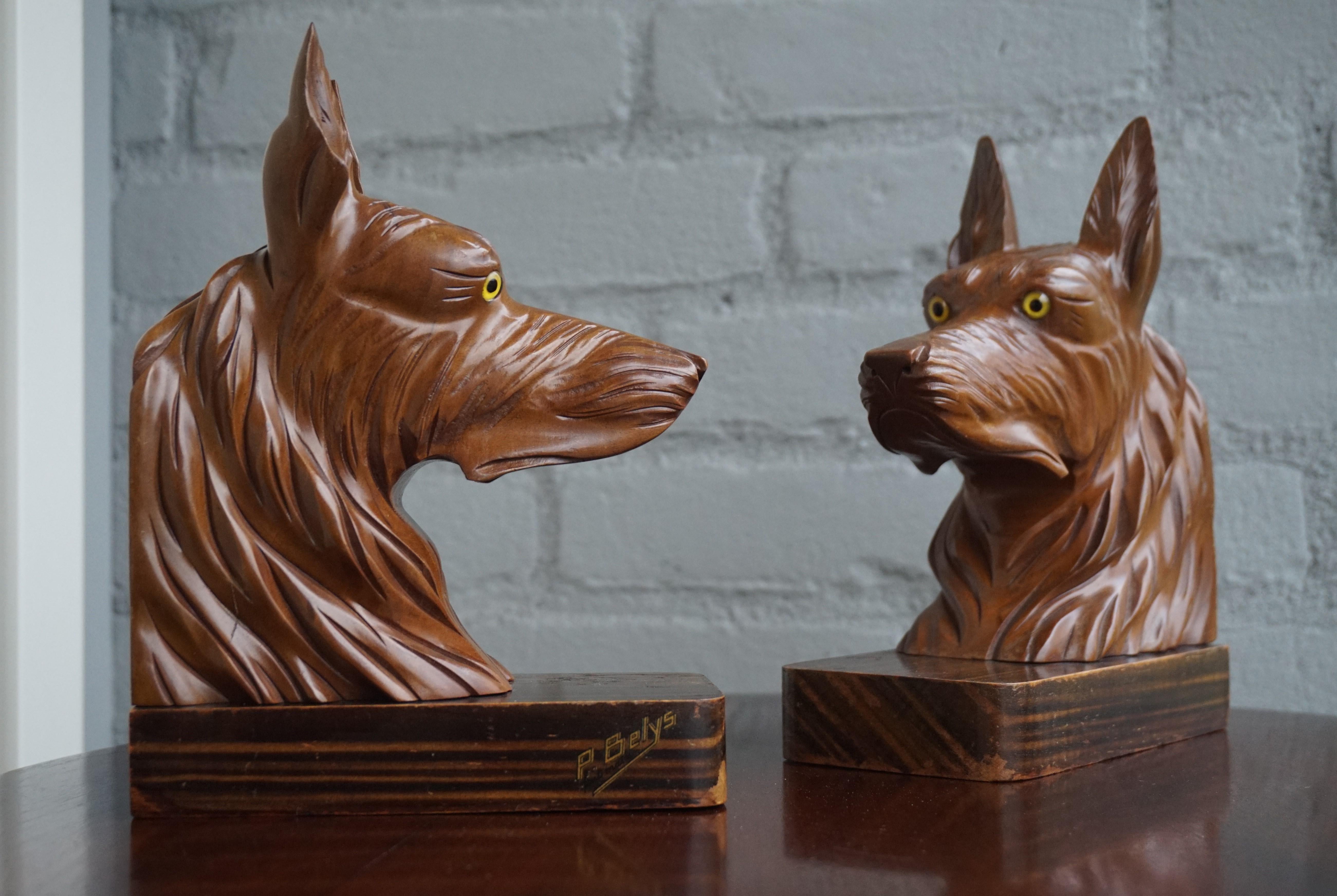 Marvelous pair of stylized and quality carved sheepdog bookends by P. Belys.

In this day and age it is getting ever harder to find anything that is really handcrafted, let alone something of good quality. In 1920s and 1930s Europe many home