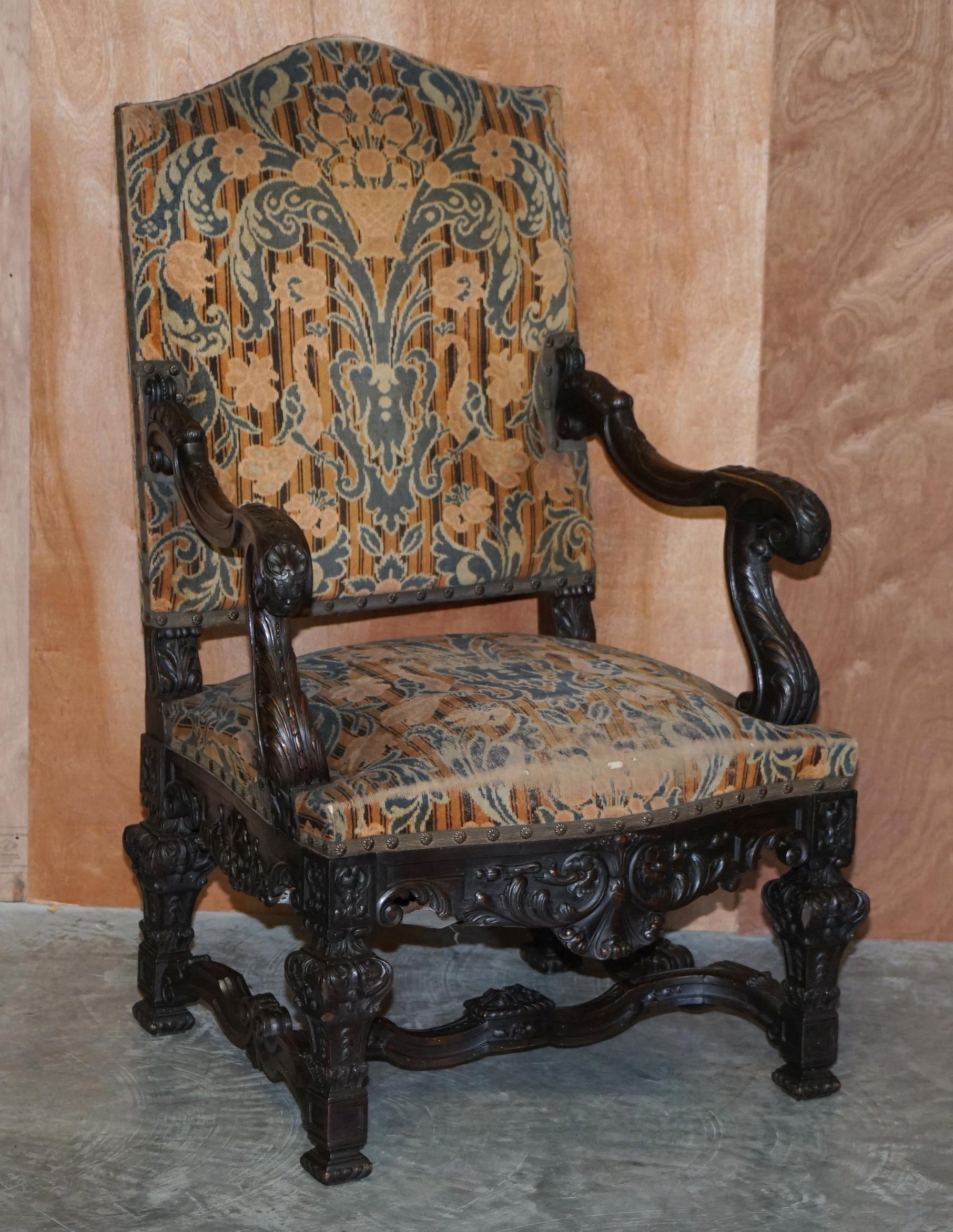 We are delighted to offer for sale this lovely pair of original Italian circa 1860 hand carved walnut throne armchairs with period upholstery

A wonderfully decorative and super original pair of Venetian hand carved throne armchairs. The frames
