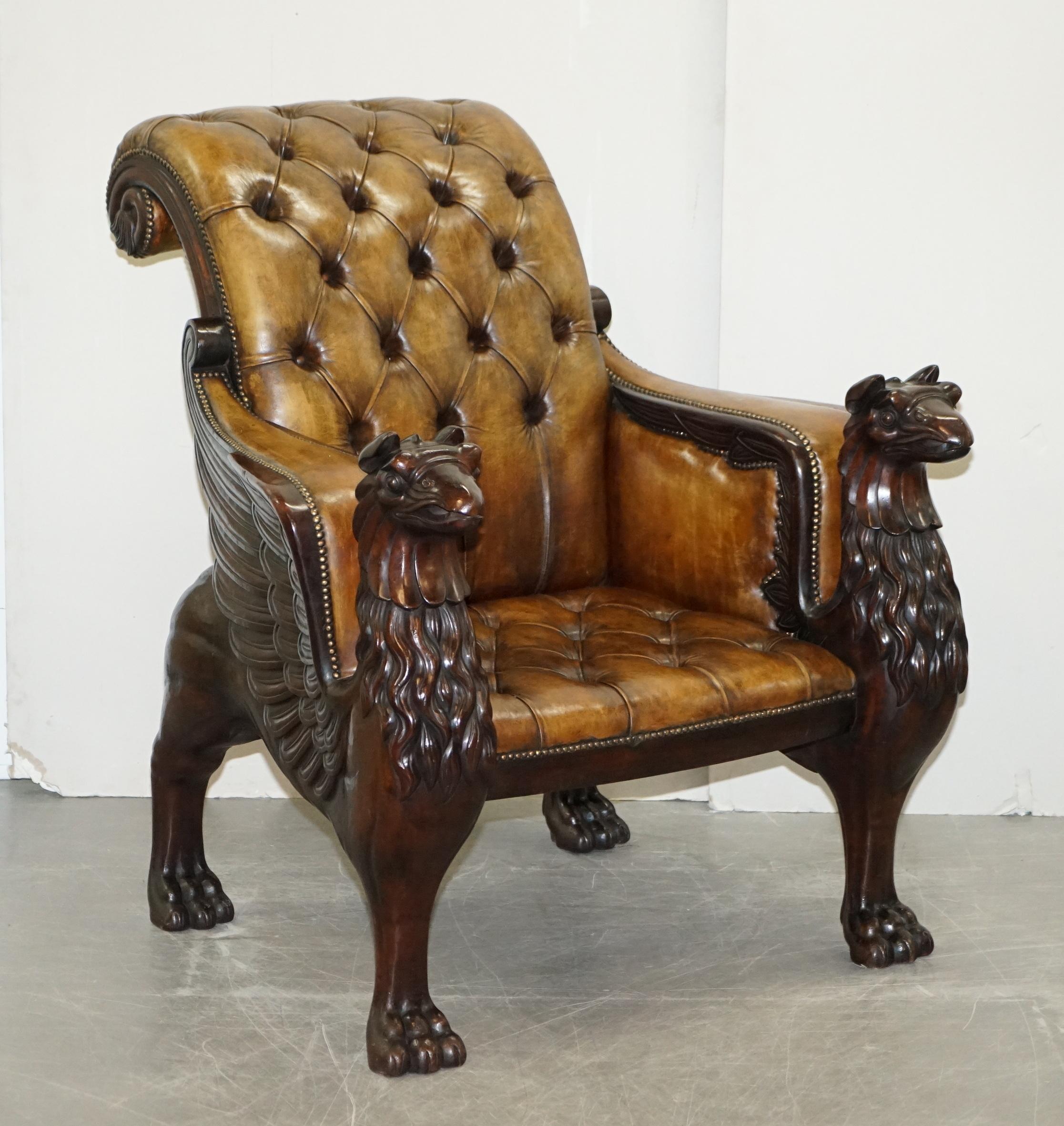 We are delighted to offer for sale this lovely pair of enormous hand carved Griffon armchairs with hand dyed brown leather Chesterfield upholstery 

These chairs are massive, I mean absolutely massive, the carving is exquisite, to the sides of the