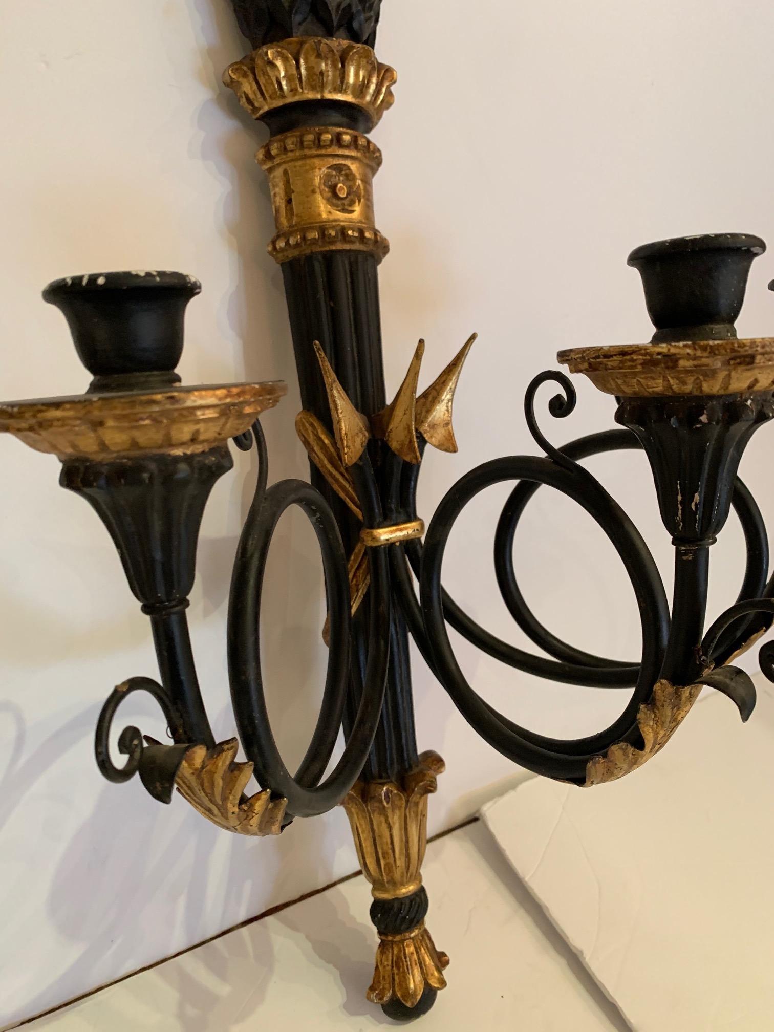 black and gold candle sconces