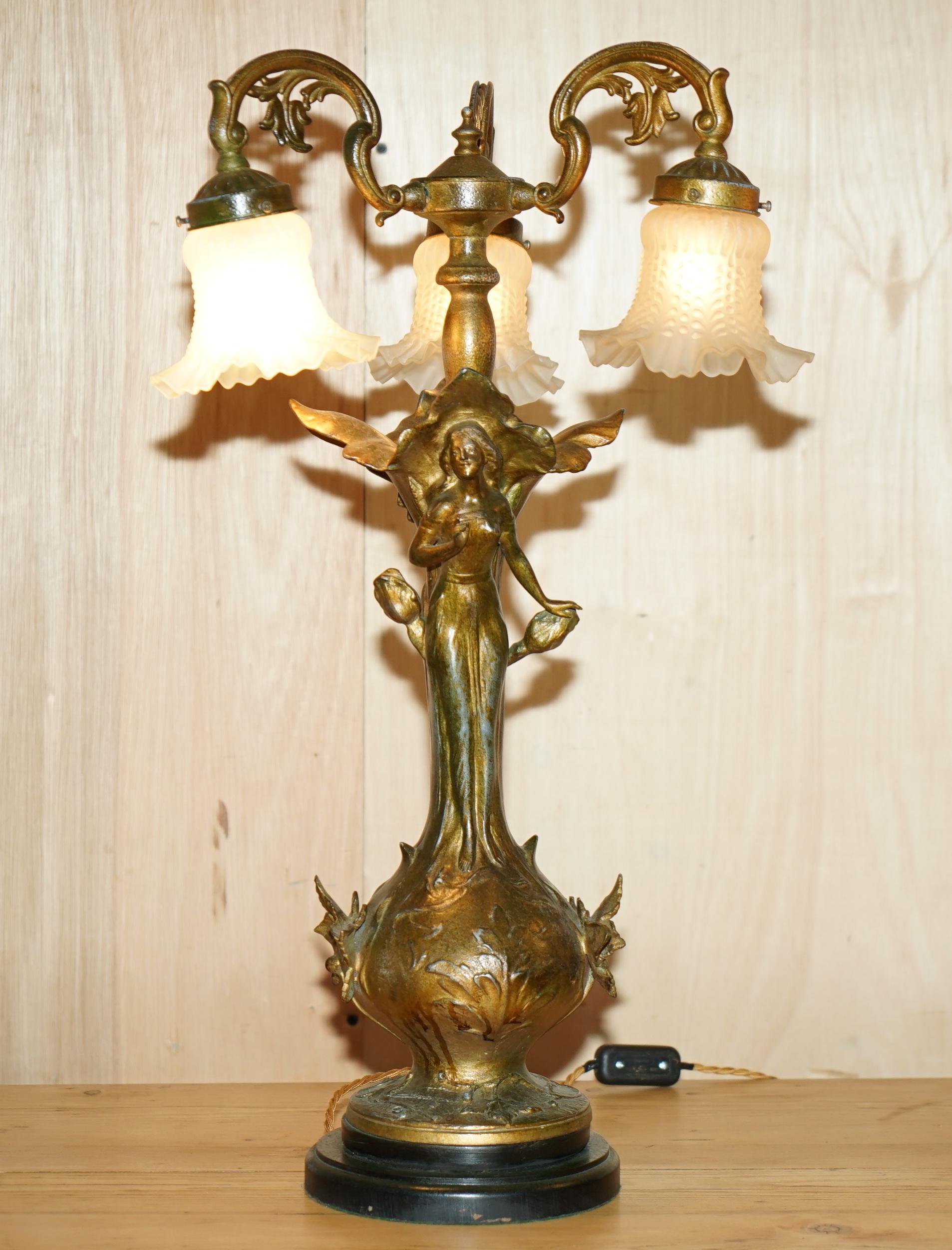 Royal House Antiques

Royal House Antiques is delighted to offer for sale this stunning pair of vintage circa 1920's French Art Nouveau maiden lamps with the original shades and bronzed finish 

They are in absolutely stunning condition, fully