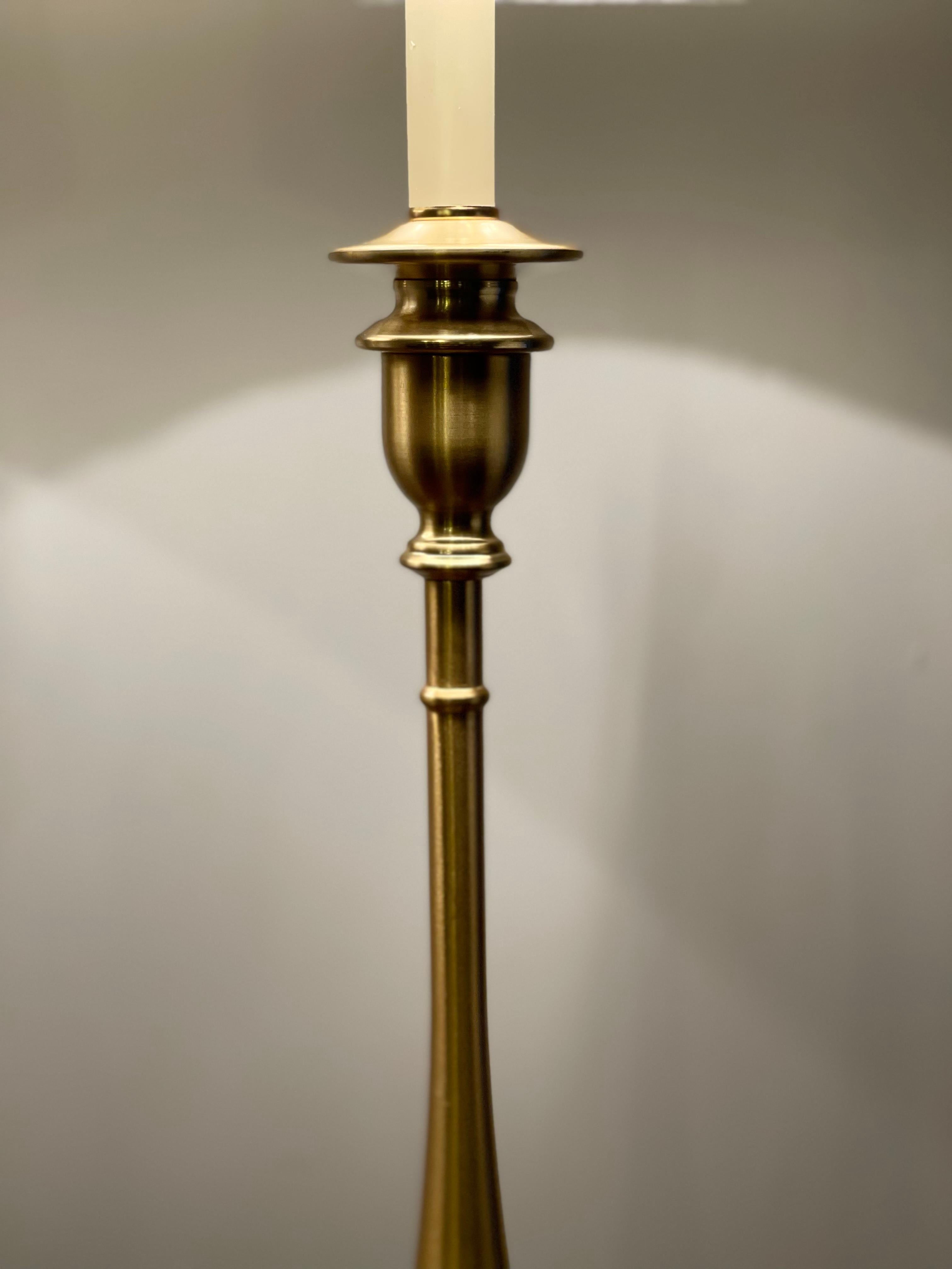 We are delighted to offer for sale this lovely brand new Ralph Lauren brass finish tall candlestick lamp with original shade.

This lamp is totally brand new, it has been removed from the box solely to take the pictures, it was then reboxed and is