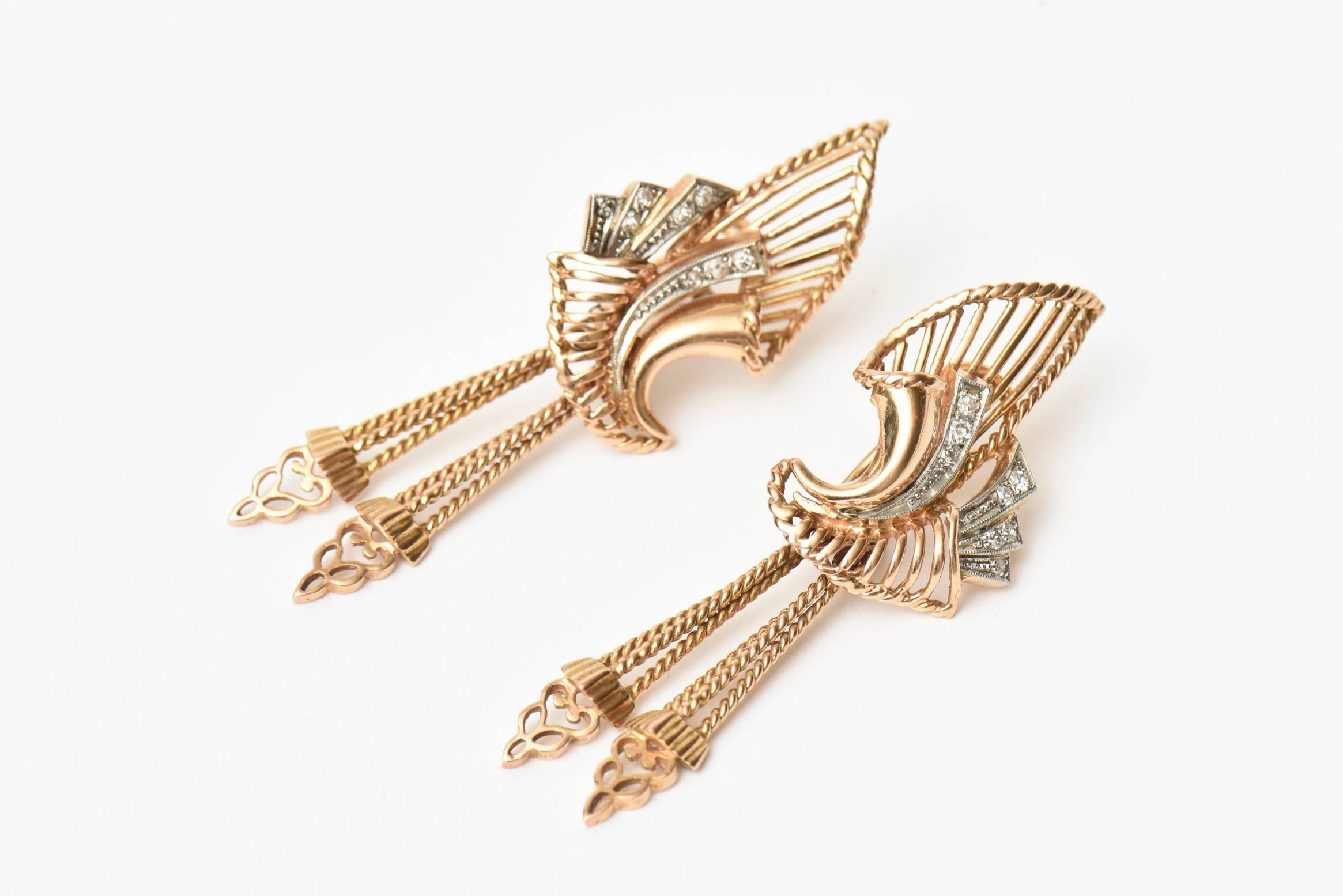 These gorgeous and elegant hallmarked retro pair of 18K rose gold and diamond pierced lever back earrings are stunning on the ear lobe.  There are approximately 0.25 carats of diamonds. The weight in grams for the earrings are 14.8. These are