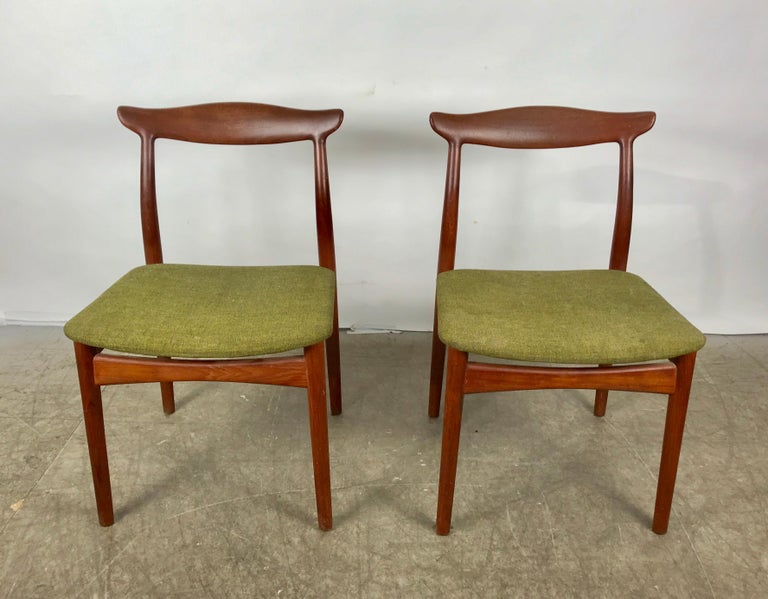 Stunning pair of sculptural side chairs, Arne Vodder for Vamo Sonderborg Pv. Wonderful sculptural design. Superior quality and joinery. Amazing original patina and finish, retains original green wool fabric. Also retains original burn in maker's