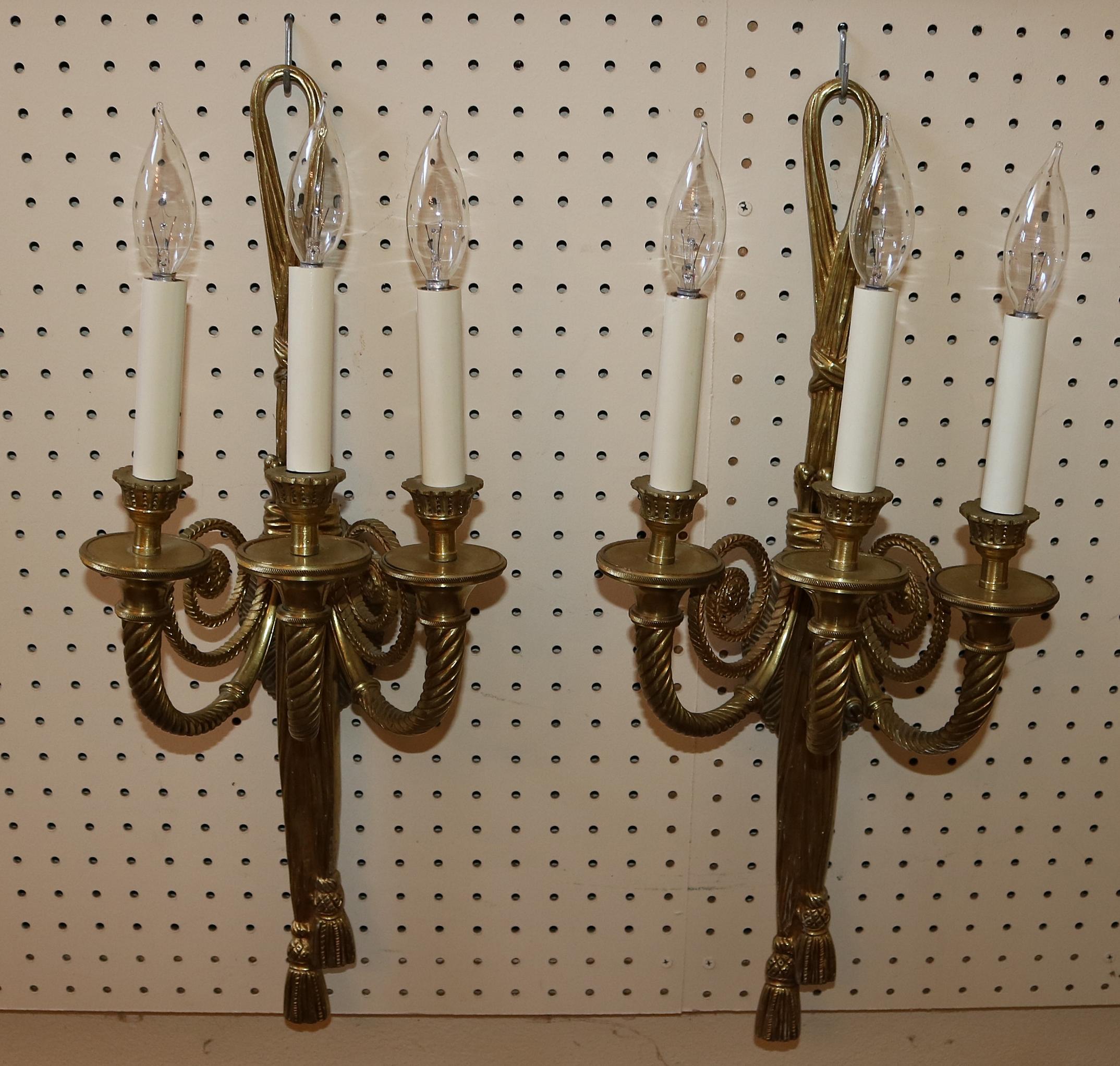 ​Stunning Pair of Solid Brass 3 Arm Louis XVI French Style Ribbon Sconces

Dimensions : 24