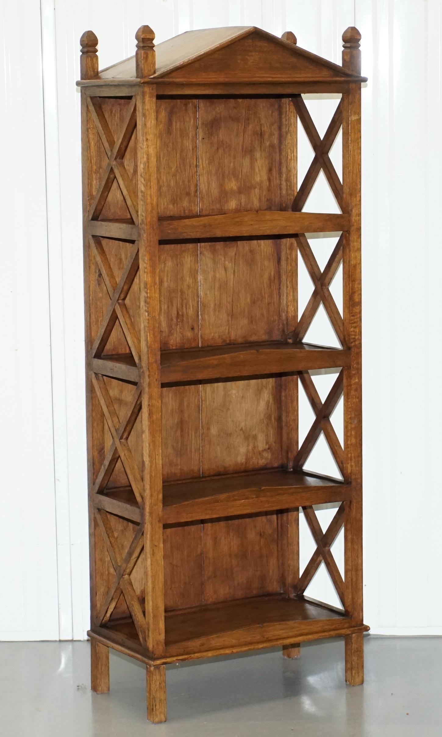 We are delighted to offer for sale this lovely pair of steeple top bookcases in solid wood

A very well made and decorative pair of open bookcases, great for displaying trinkets

We have cleaned waxed and polished them from top to bottom, they