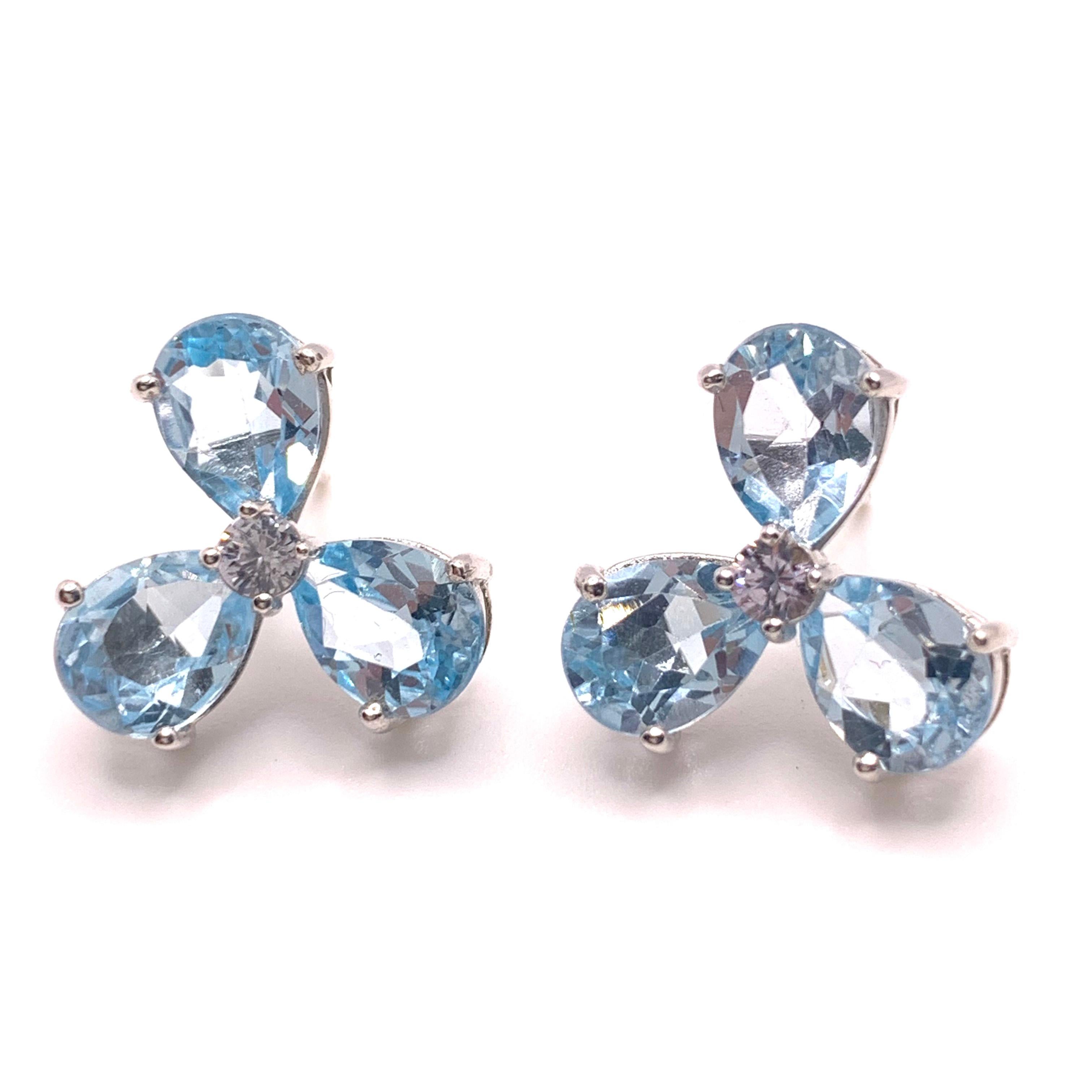 Contemporary Stunning pair of Three-petal Genuine Blue Topaz Flower Earrings