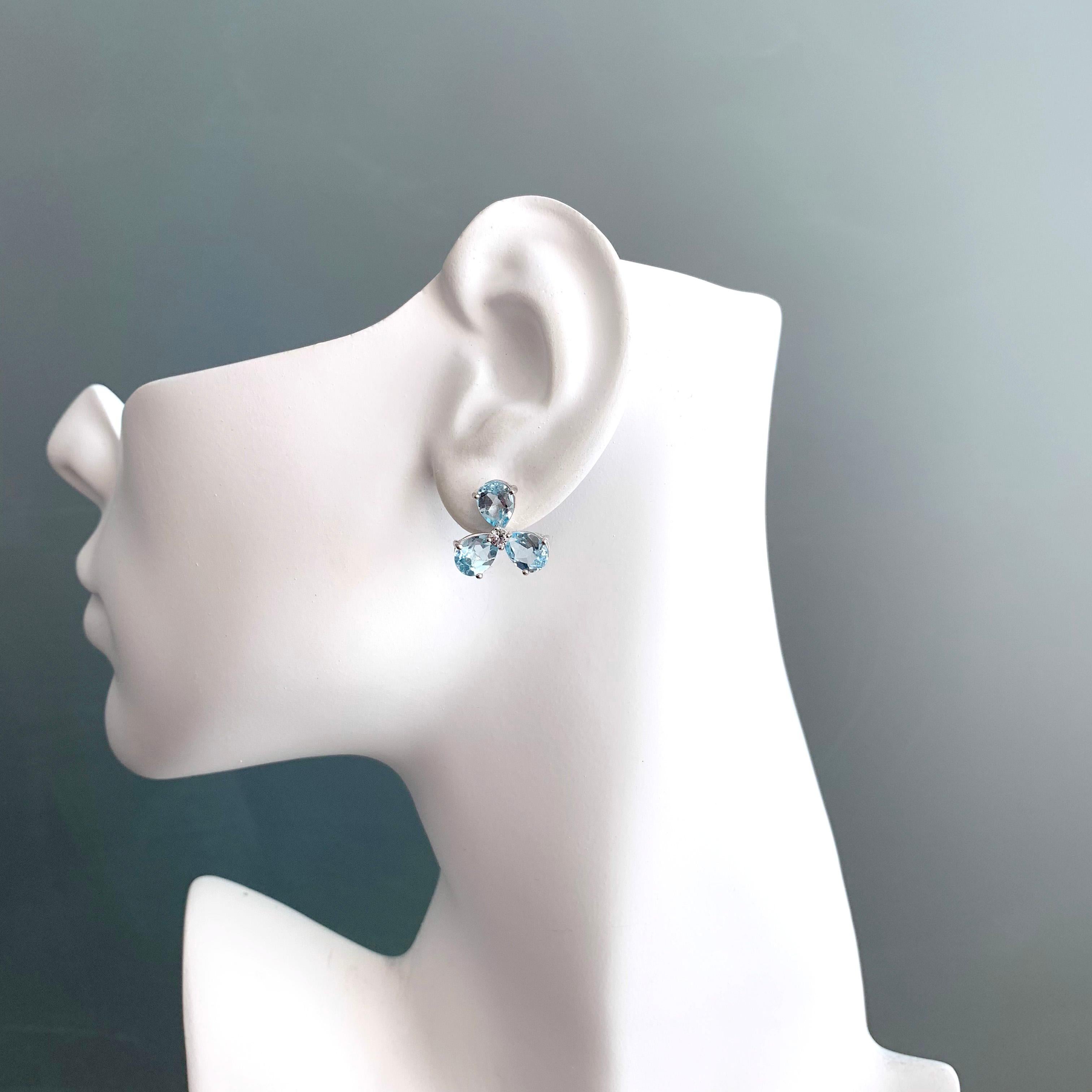 Pear Cut Stunning pair of Three-petal Genuine Blue Topaz Flower Earrings