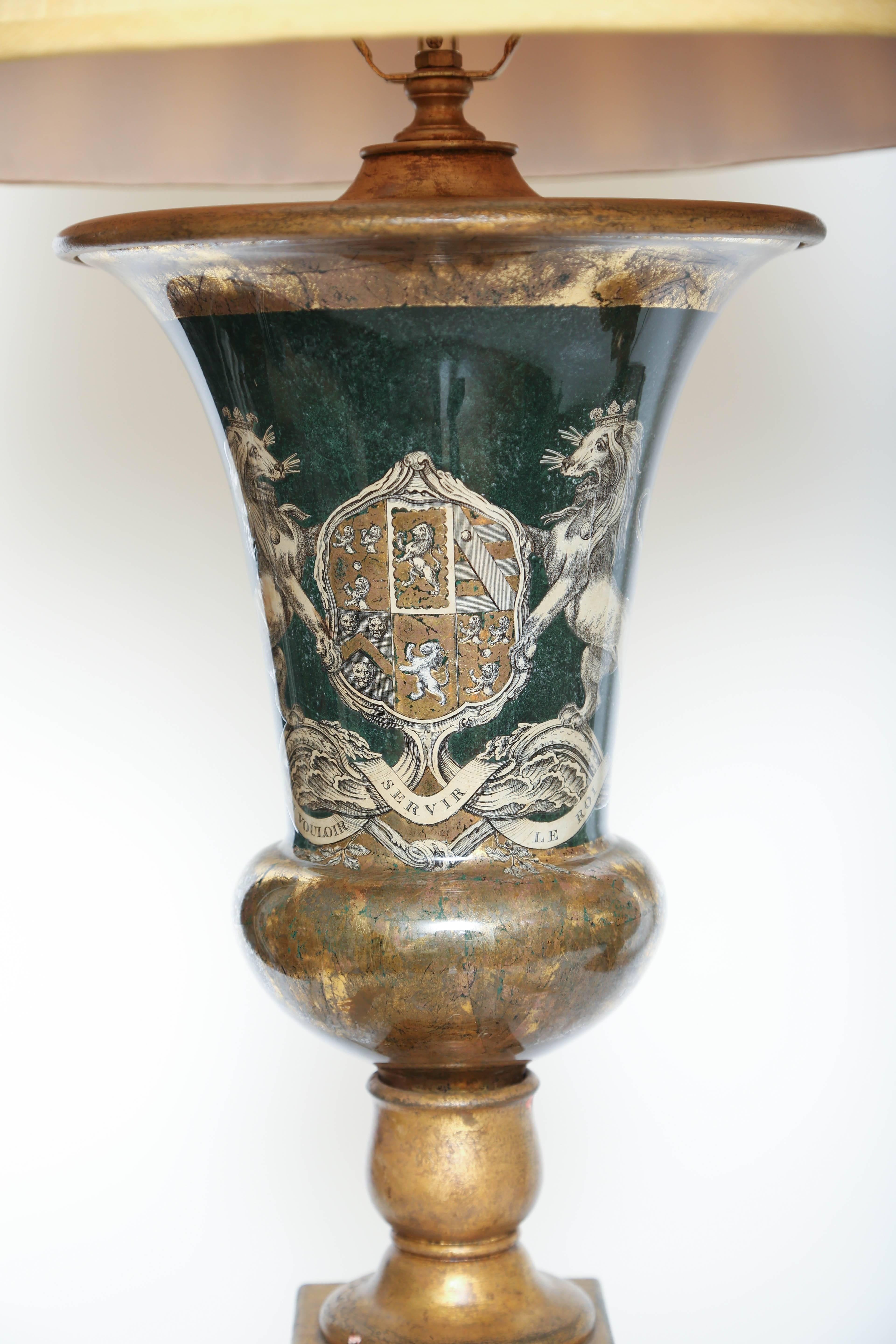 Large and unusual pair of decalcomania armorial lamps on dark green background with parcel gilt. Base with Earldom crown. Shades not included.