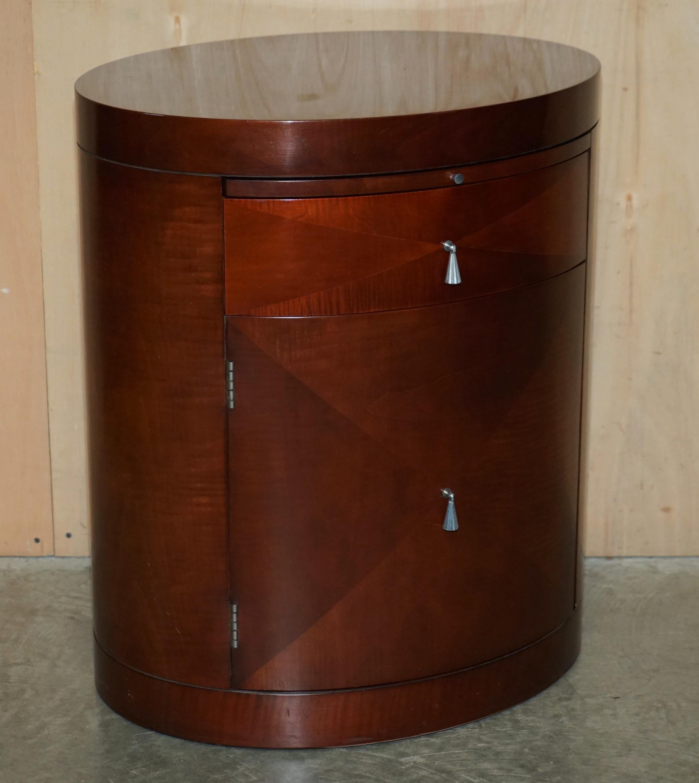 We are delighted to offer for sale this sublime pair of vintage Flamed Mahogany oval Baker Furniture side end tables with butlers serving trays 

A truly stunning and well made pair, the timber is flamed mahogany, it has a wonderful patina and