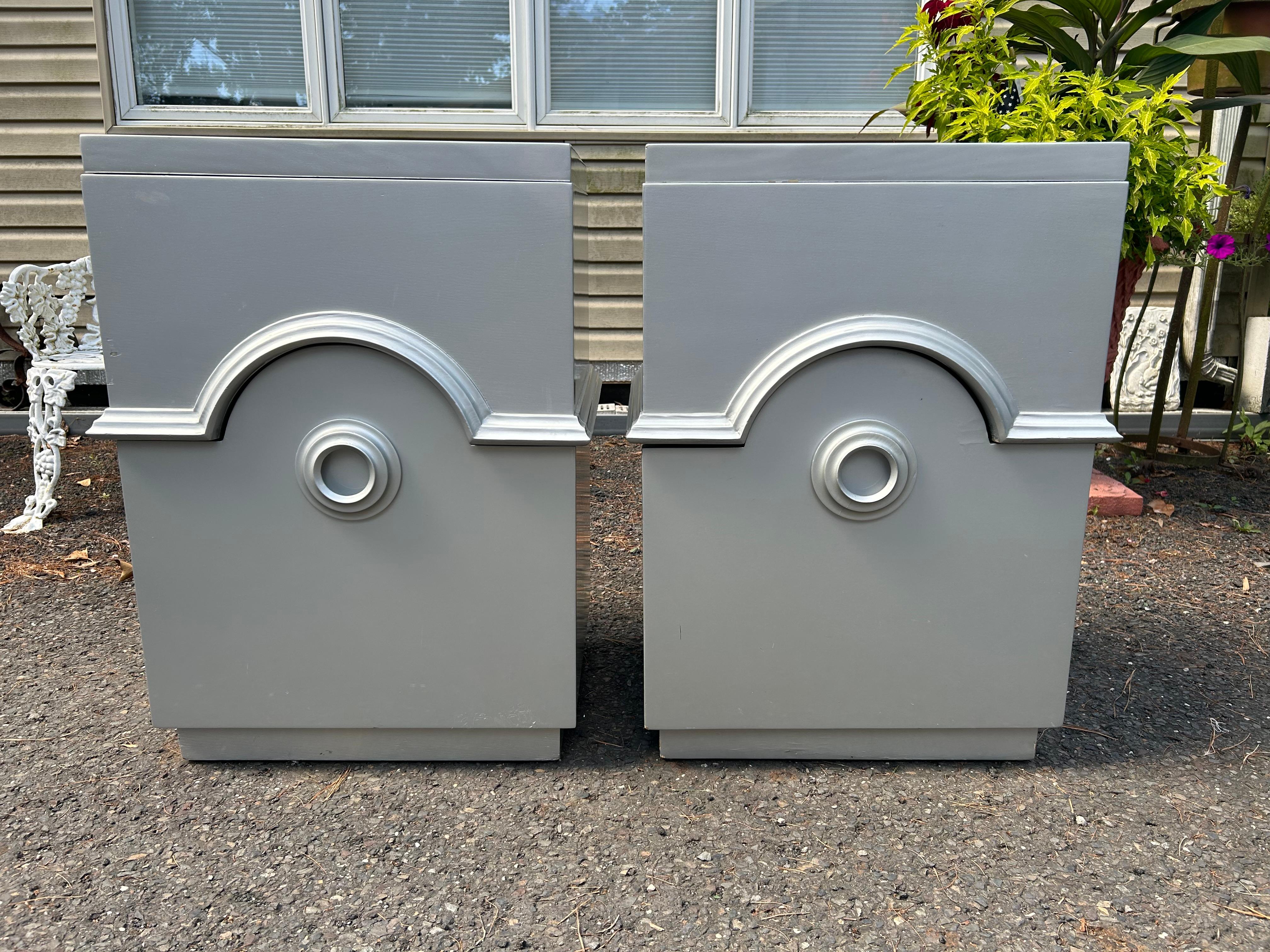 Stunning pair of signed James Mont night stands.  This pair have been professionally lacquered silver within the last 5 years and still look good.  They measure 29