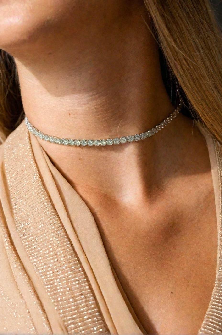 This exquisite necklace is crafted in 14K white gold, featuring a chic paperclip-style design. Adorned with 5.03ct of natural round diamonds, it offers a perfect blend of modern elegance and timeless sophistication. Ideal for elevating any look,