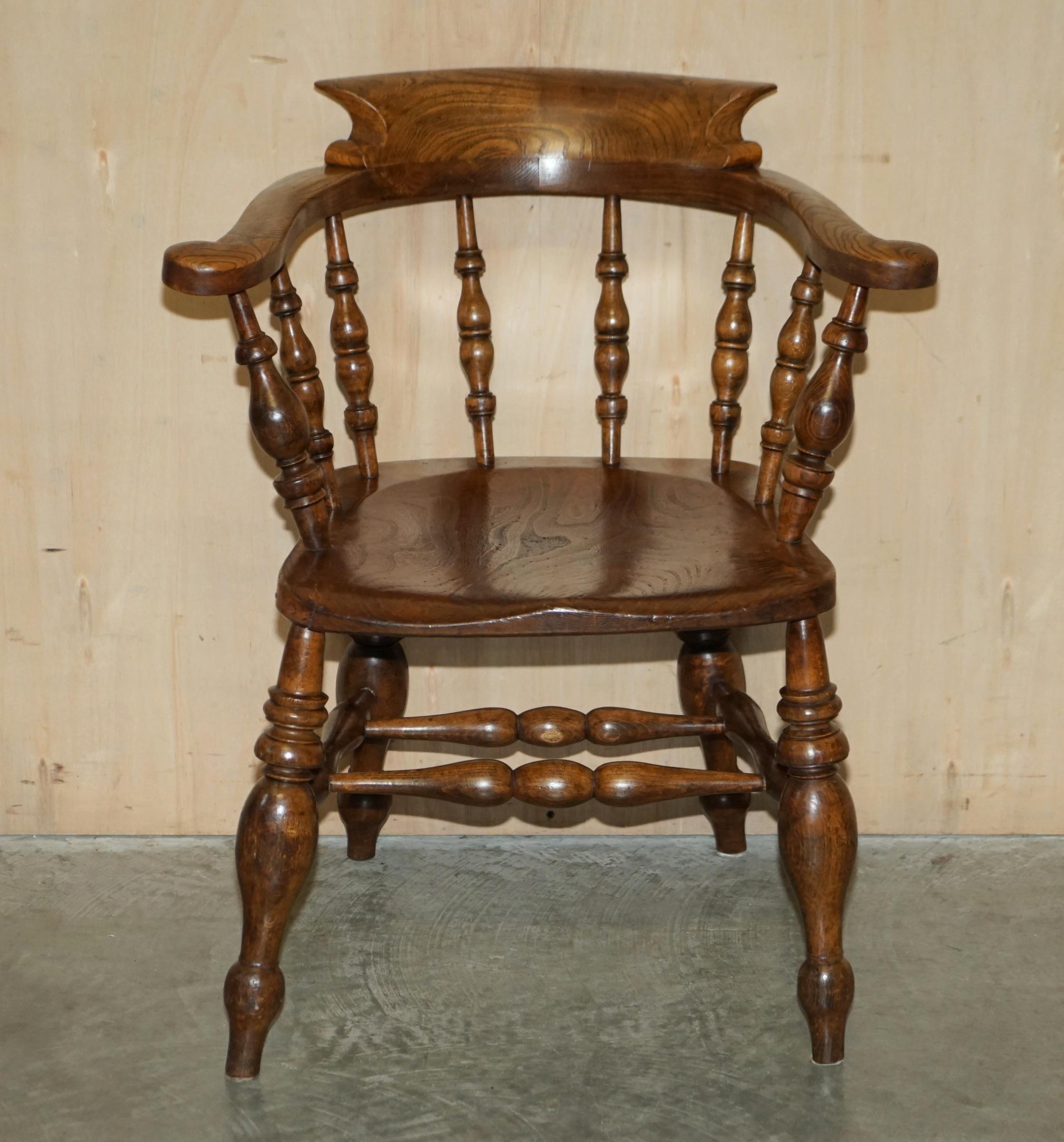 We are delighted to offer for sale this lovely hand made in England sold elm with sublime patina, Elm bow back smokers captains armchair 

A good looking and decorative chair nicely made and very ornate for its type. With these types of chairs you