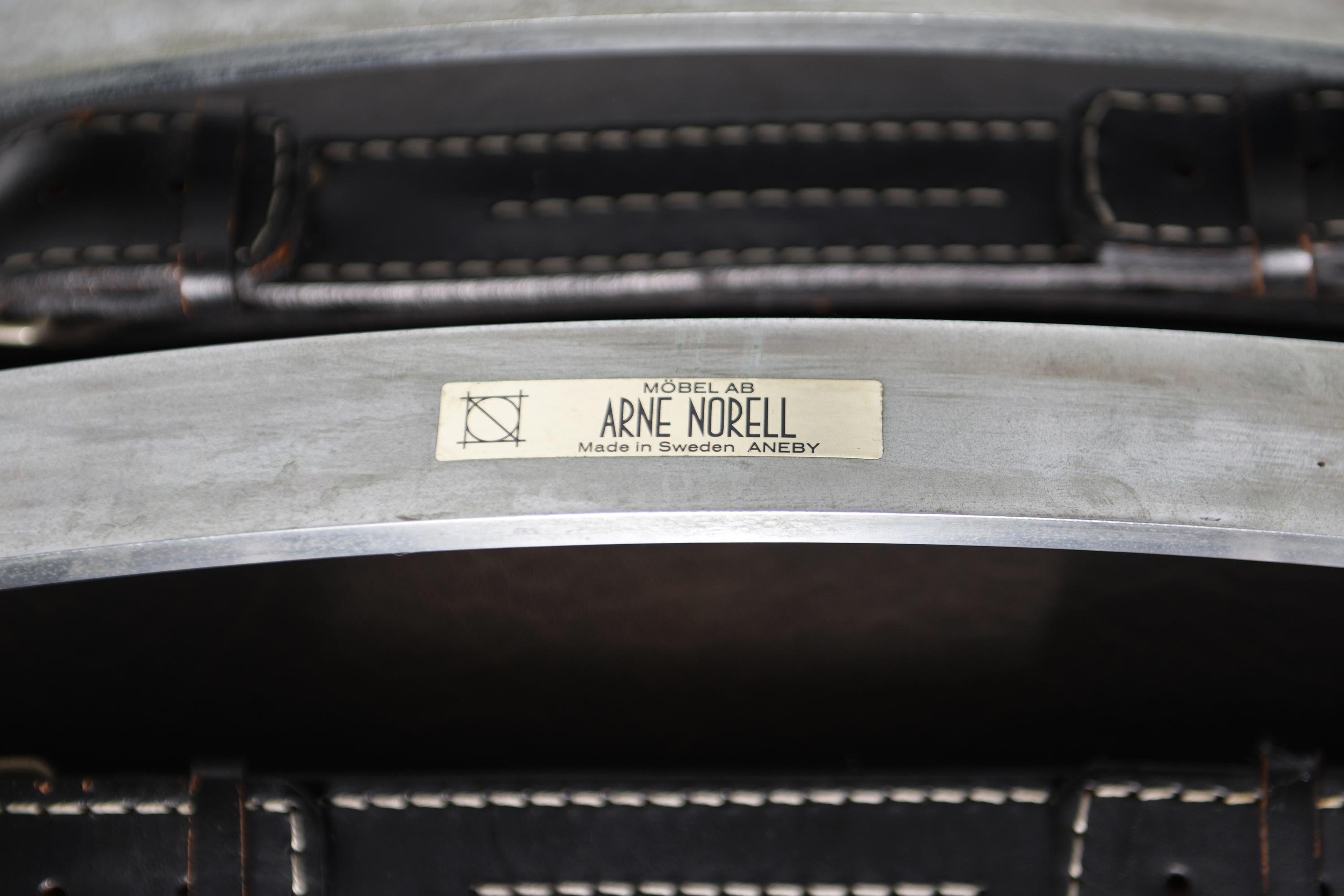 Stunning patinated ARI lounge chair in brown leather by Arne Norell - Möbel AB For Sale 2