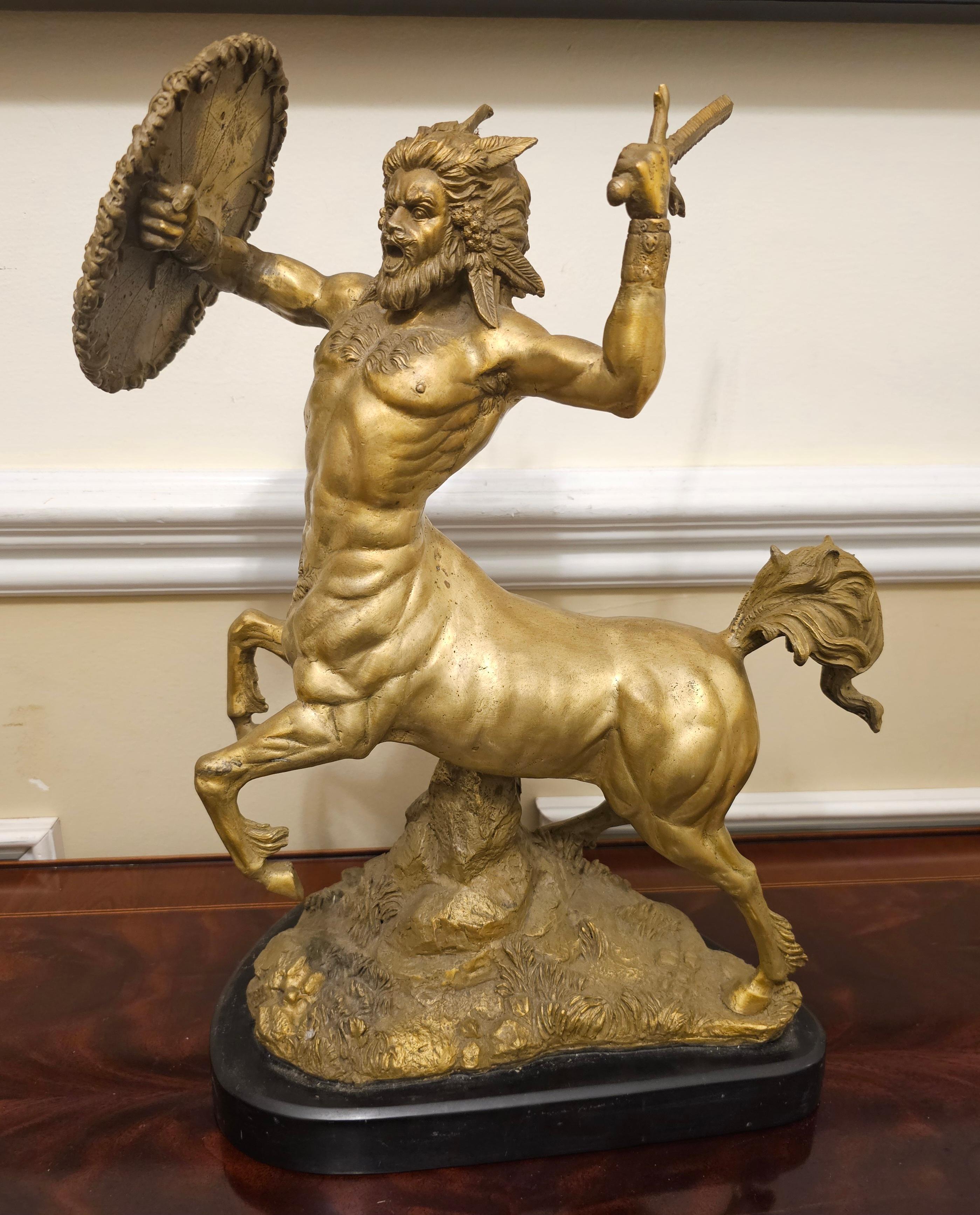 Stunning Dore Bronze Sculpture of a Centaur in Battle on  Slate Plinth. The Powerful Centaur Comes Barreling Out Of The Realm Of Greek Mythology Wielding A Sword And Shield Of Snakes In Hand. His Powerful Hooves Beat Down On The Ground As A Yell Of