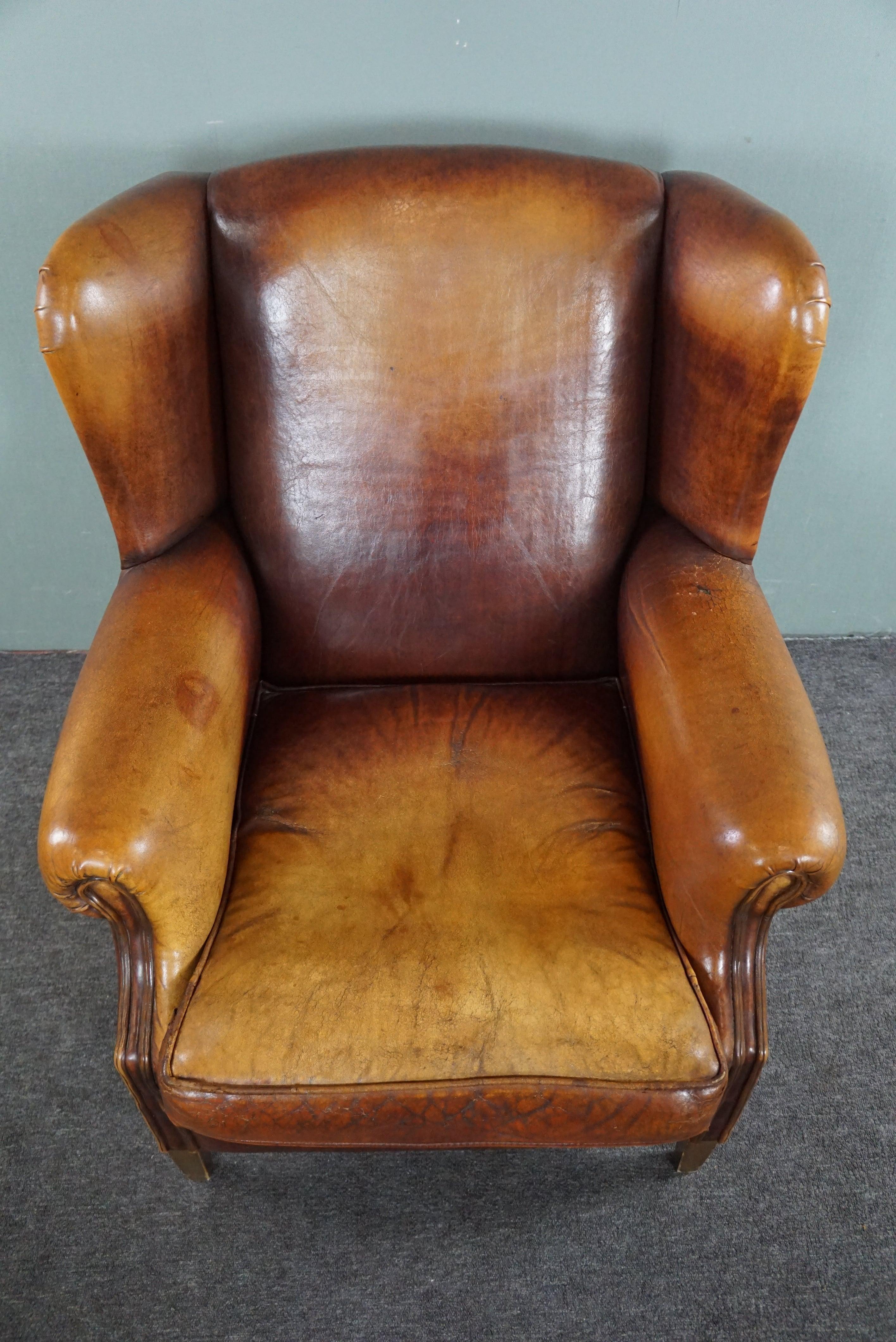 Contemporary Stunning patinated sheepskin leather wing chair For Sale