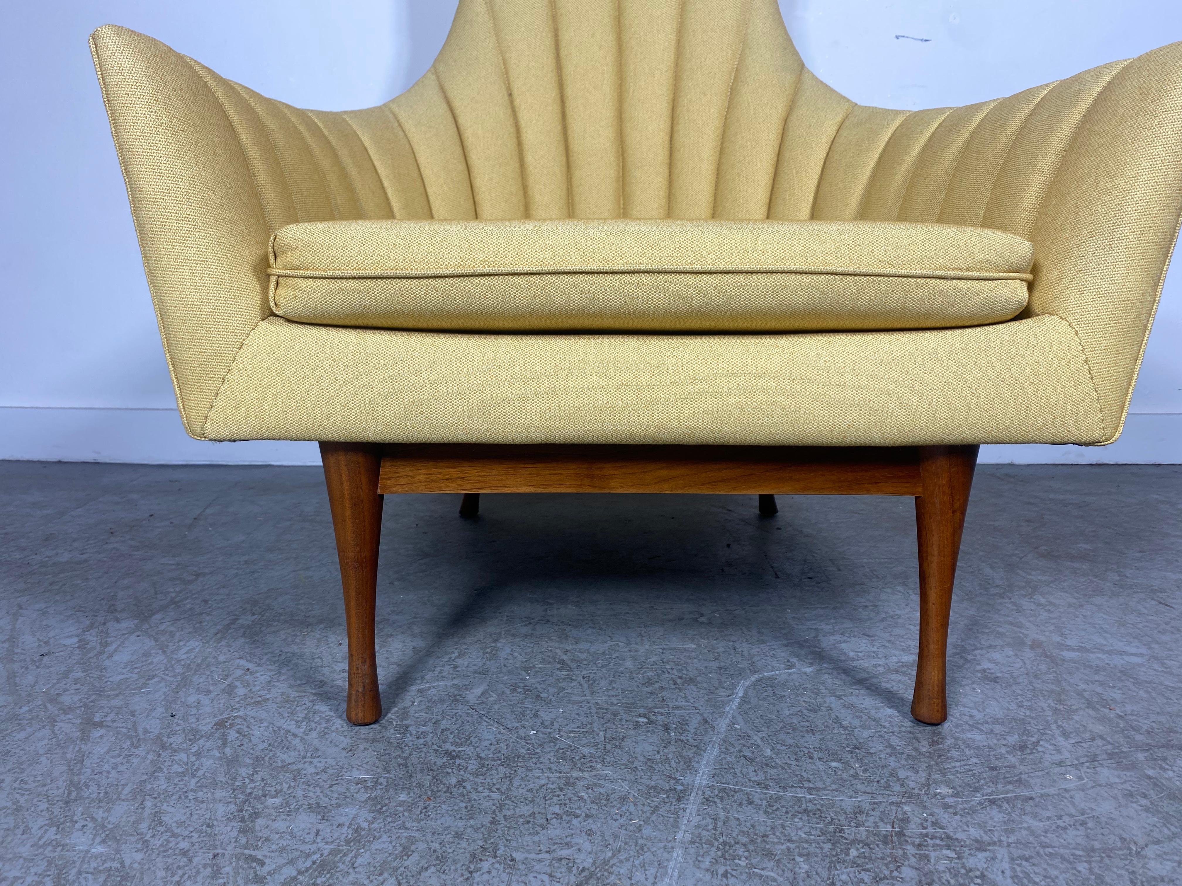 Seldom seen Paul McCobb high back Symmetric Group lounge chair for Widdicomb with new pale yellow  Romo fabric.
Overall mint condition! McCobb Symmetric Armchair 908/
Walnut..Extremely comfortable.. Classic high modernist design.. . Please check