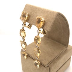 Stunning Pear Shaped Citrine and Diamond Earrings Set in 18 Karat Yellow Gold