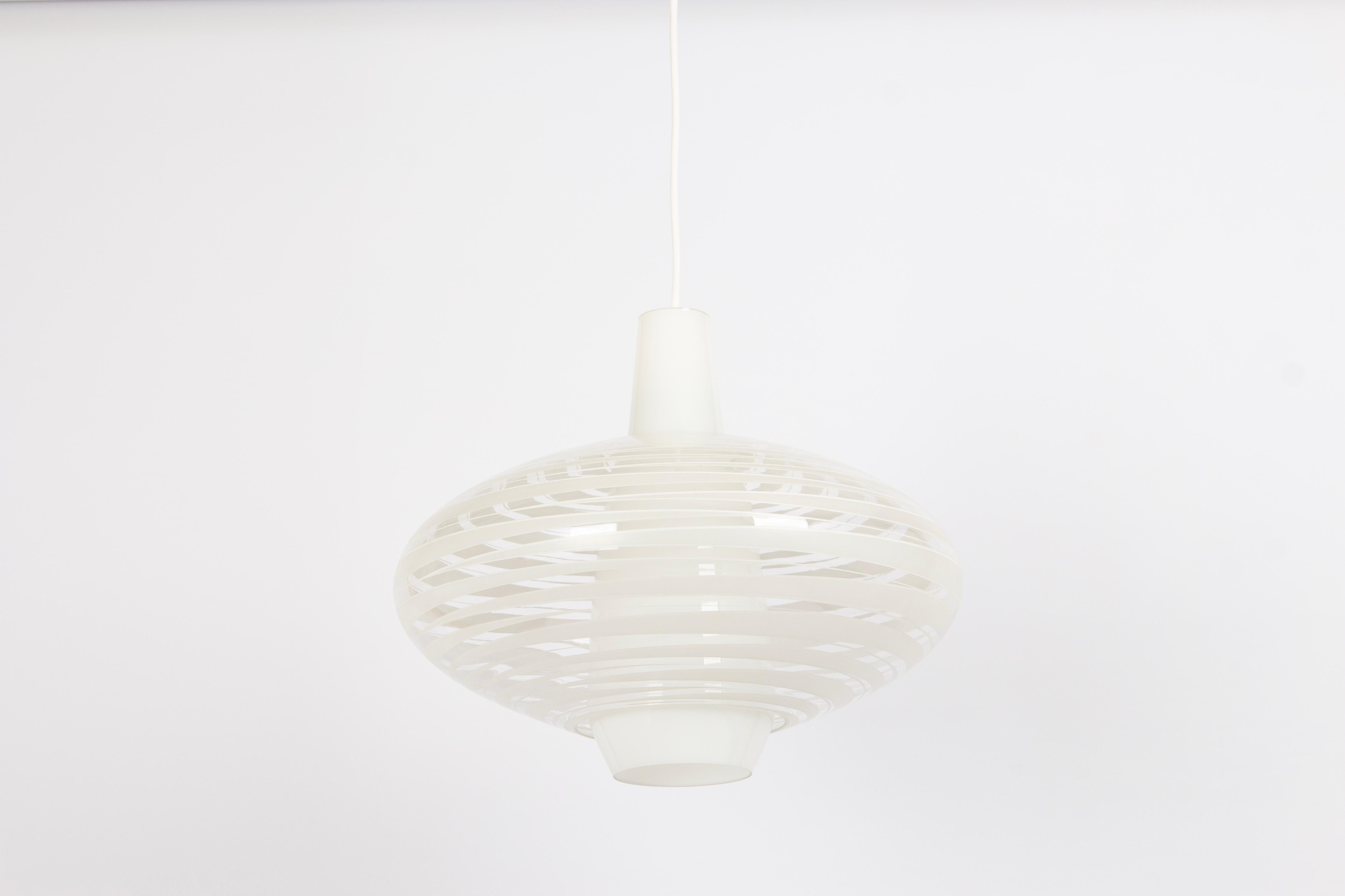 A rare stunning pendant light designed by  Aloys Gangkofner for Peill & Putzler, Bari, Germany, 1950s
He designed this model in the 1950s
Very good condition.

Socket: 1 x E26/ E27 standard bulb -up to max. 100 watt
Light bulbs are not included. It