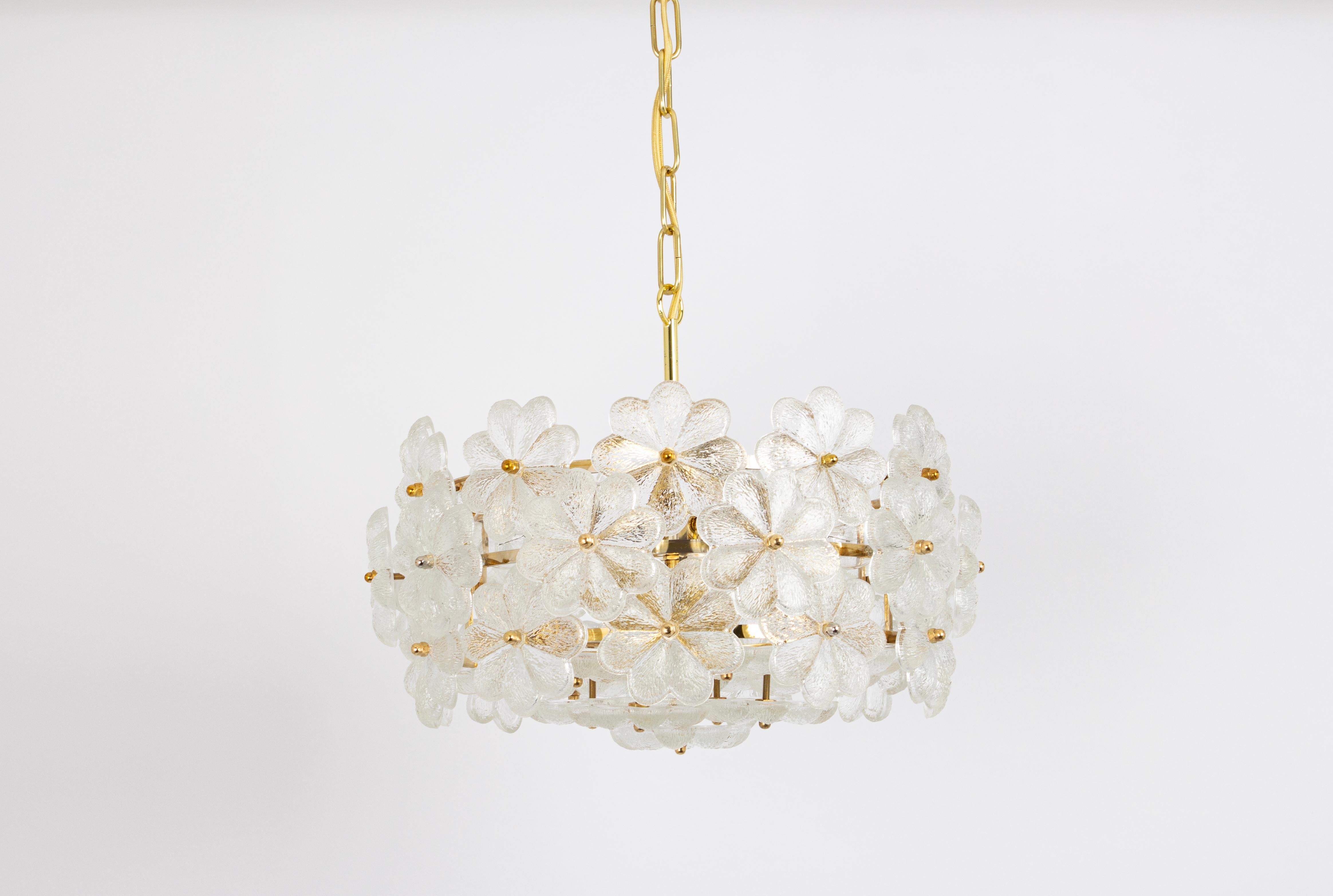 Petite stunning chandelier with many Murano flower crystal glass over a brass frame, made by Ernst Palme in Germany, 1970s.
High quality and in very good condition. Cleaned, well-wired and ready to use. 

The chandelier requires 6 x E14 small bulbs