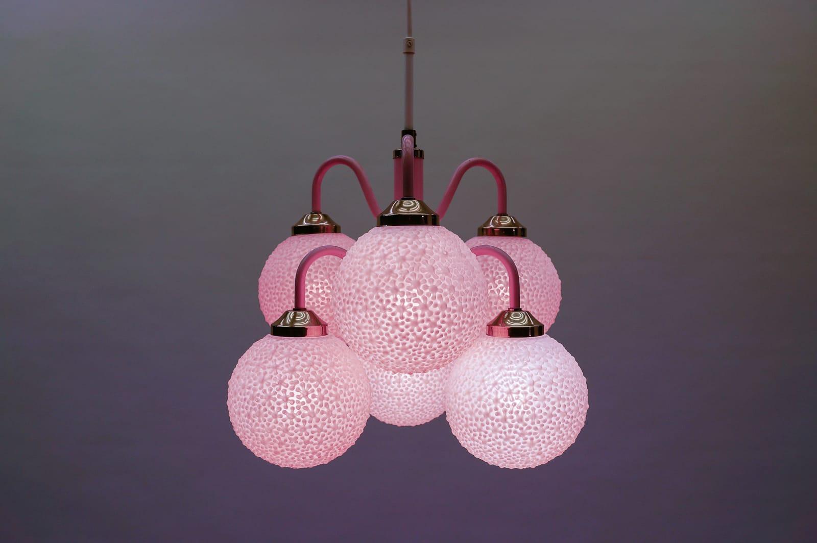 All in pink, a very rare lamp in the colour version. A real eye-catcher. 

The Lampoe is made of lacquered metal and pink glass ball shades.

Fully functional.

Six E14 sockets. Works with 220V and 110V.

Wiring is suitable for all countries.