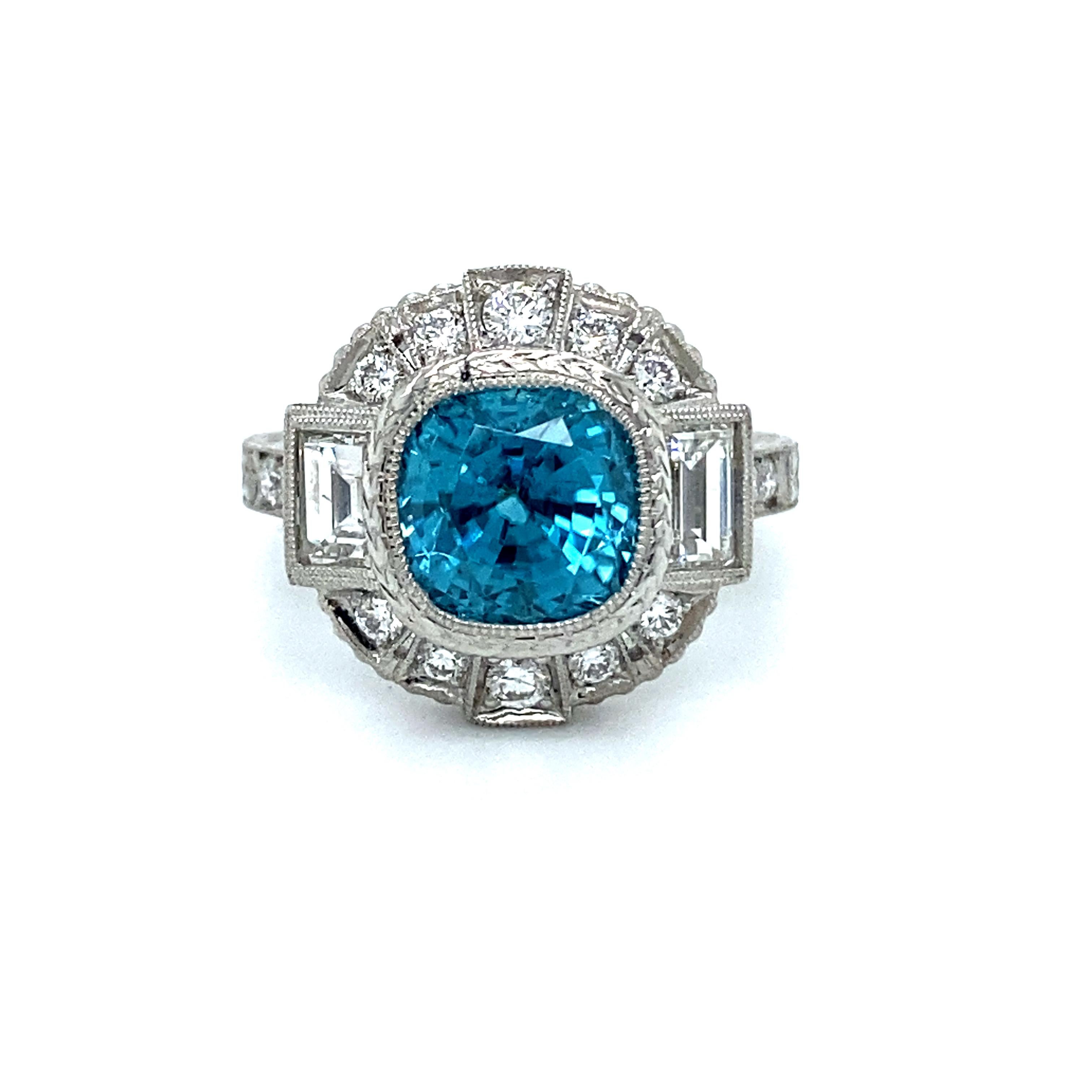 Whoa SPARKLE! I pretty much love everything about this Stunning Diamond and Blue Zircon Ring Engagement Ring - the unique design, the amazing gemstones, the blinding sparkle...I'm all into this one!! 

Crafted in Platinum, the design features a