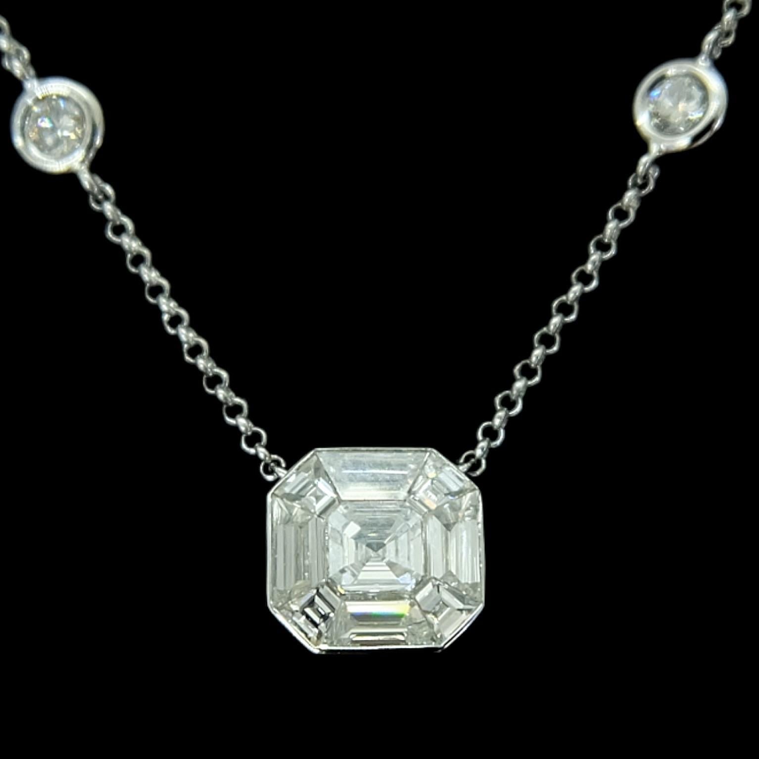 Sophia D. platinum necklace composed of 0.92 carat cushion cut diamond pendant and 6 round diamonds with a total weight of 0.56 carats. The necklace length is 9