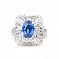 Impresionante Anillo de Platino Zafiro de 2,186 ct con Halo de Diamantes Baguette de 1,36 ct PT900