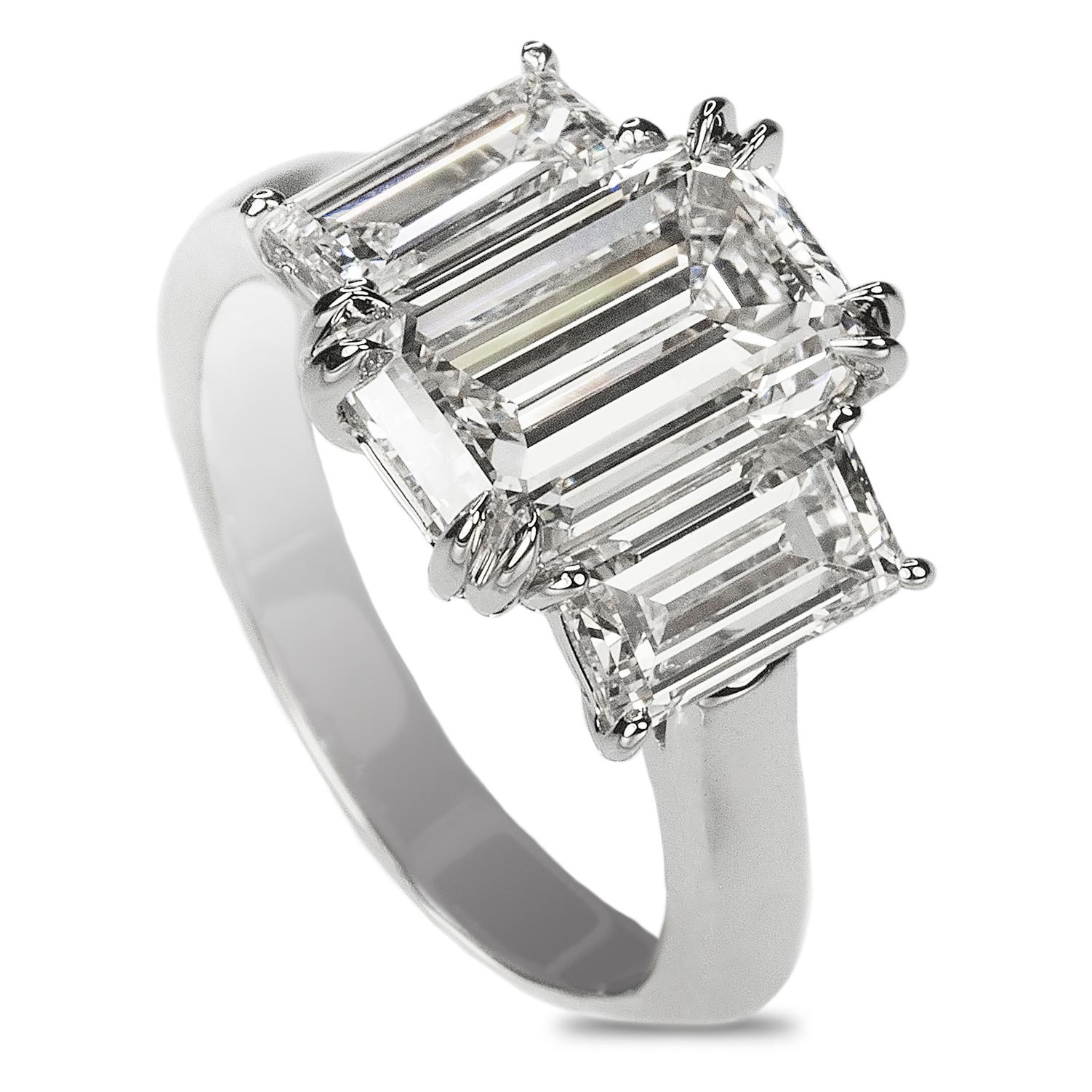 Stunning Platinum Three Emerald Cut Diamond Ring In New Condition In Sarasota, FL